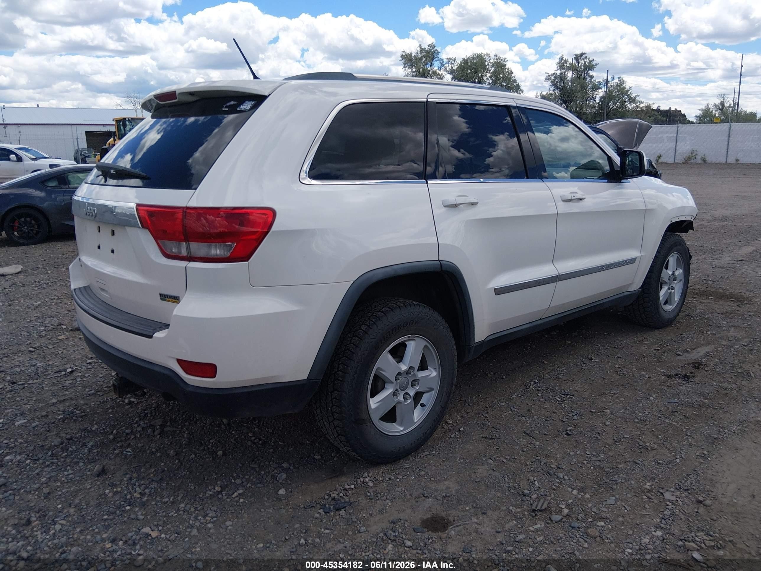 2012 Jeep Grand Cherokee Laredo Белый vin: 1C4RJFAG4CC192870