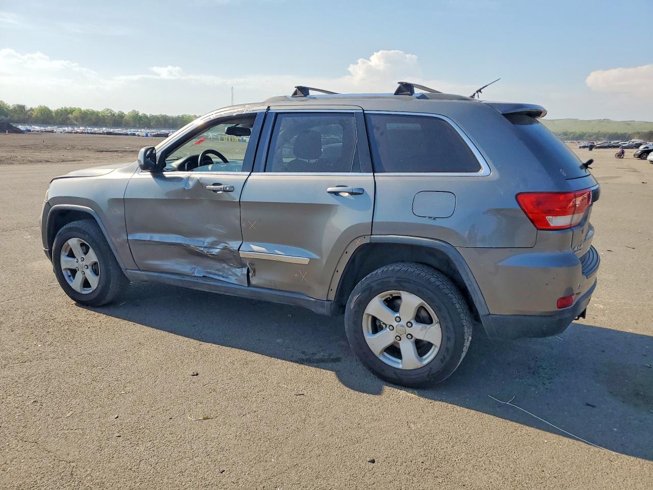 2012 Jeep Grand Cherokee Laredo Серый vin: 1C4RJFAG4CC201311