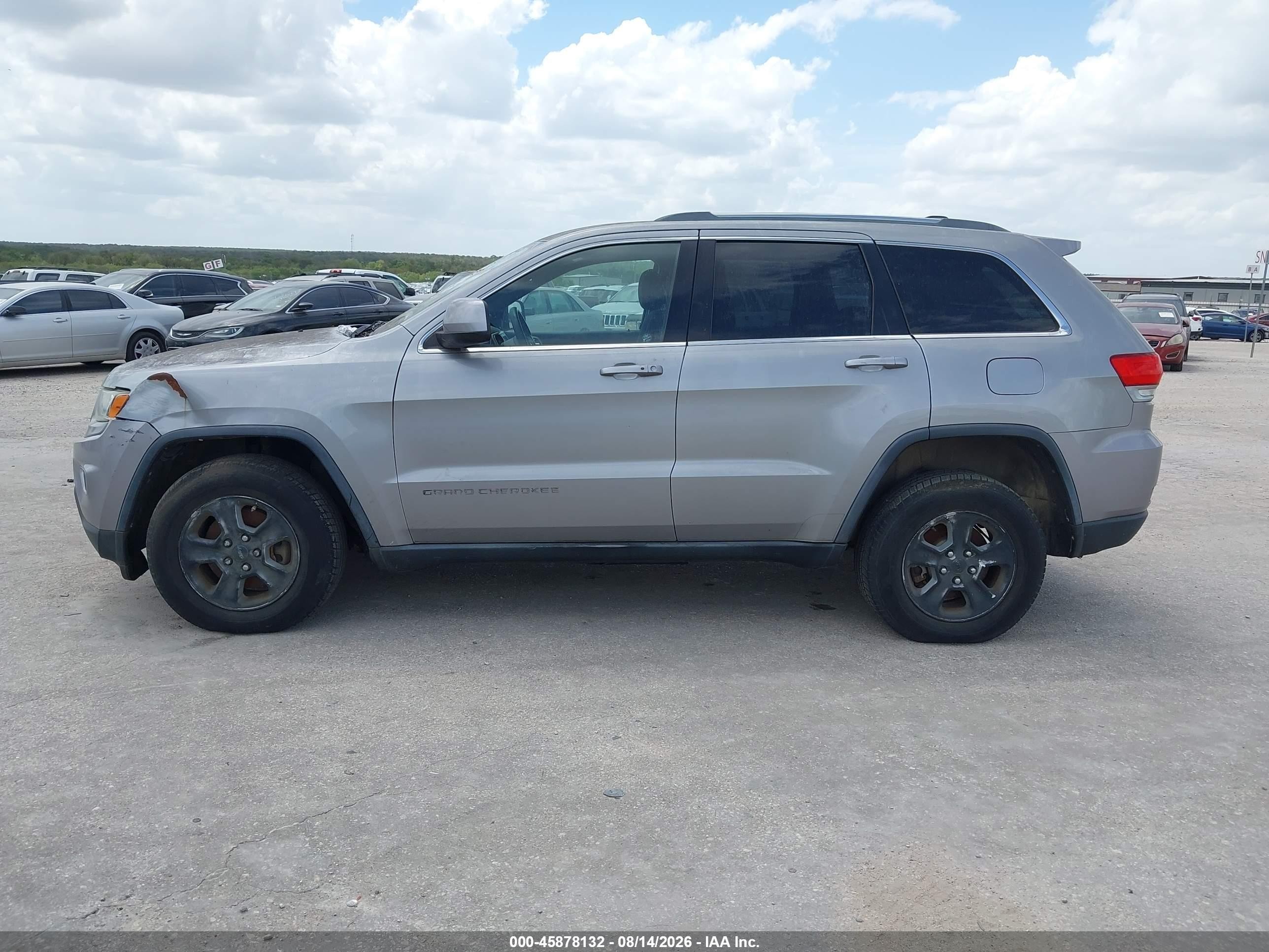 2014 Jeep Grand Cherokee Laredo Серебряный vin: 1C4RJFAG4EC372157