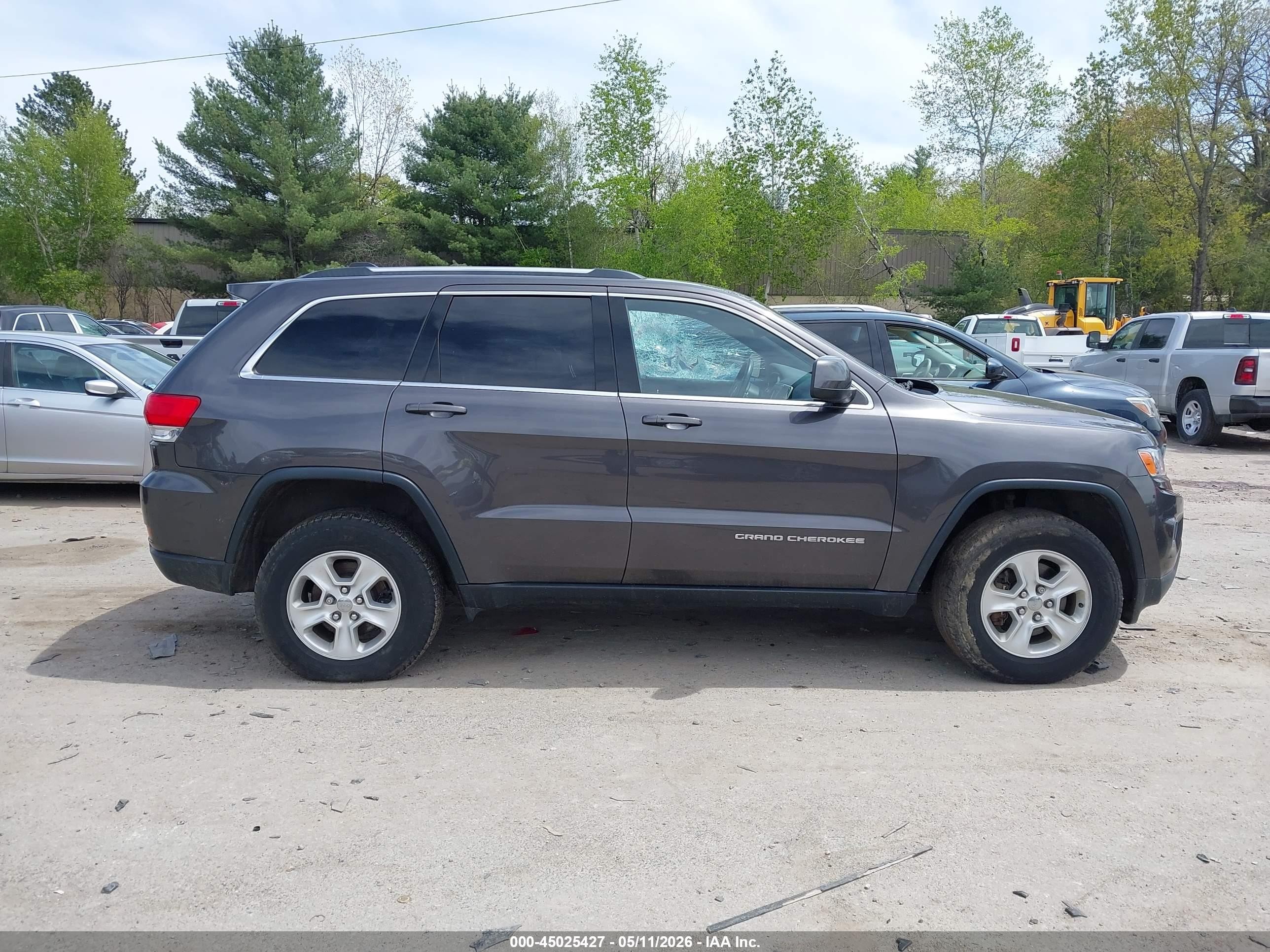2015 Jeep Grand Cherokee Laredo Серый vin: 1C4RJFAG4FC237276