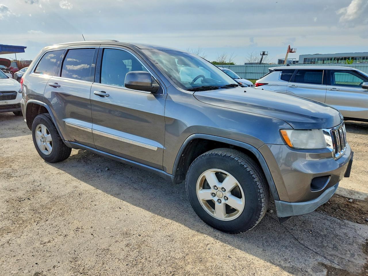 2012 Jeep Grand Cherokee Laredo Серый vin: 1C4RJFAG5CC166228