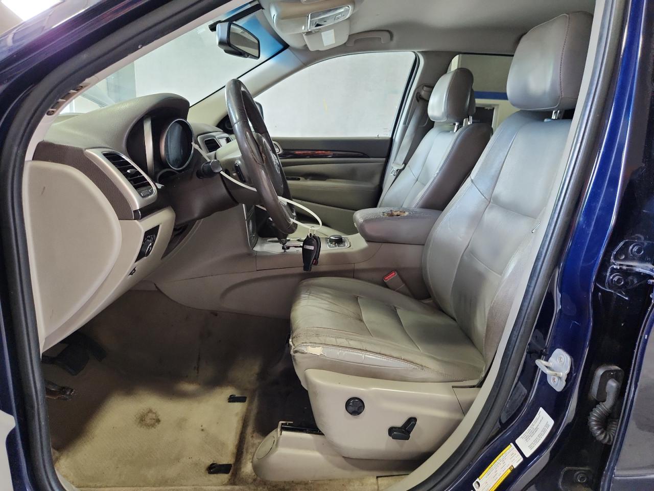 2012 Jeep Grand Cherokee Laredo Blue vin: 1C4RJFAG5CC285428 Damage: Steering Wheel, Worn, Replacement Required