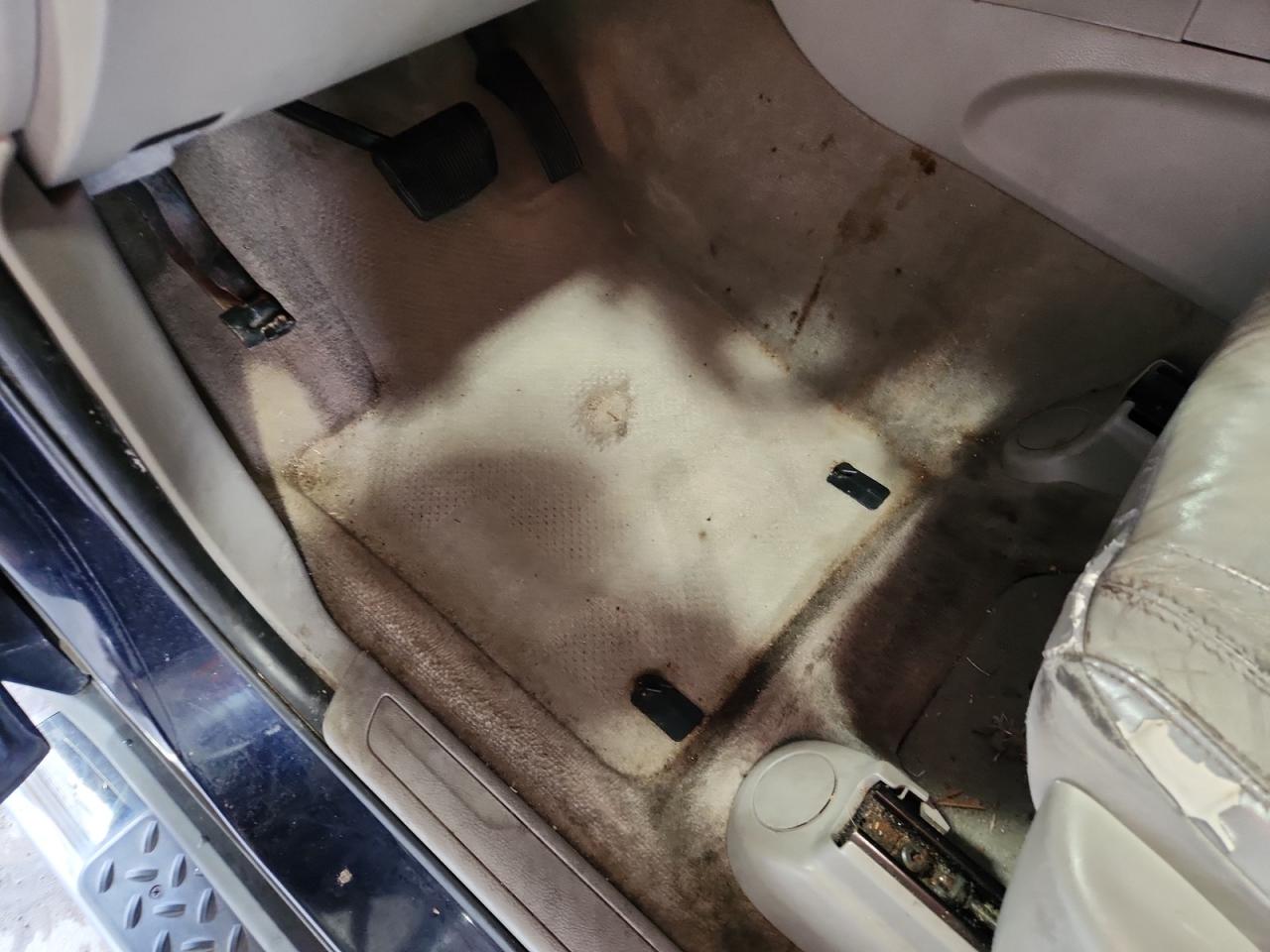 2012 Jeep Grand Cherokee Laredo Blue vin: 1C4RJFAG5CC285428 Damage: Left Front Carpet, Stained, Permanent