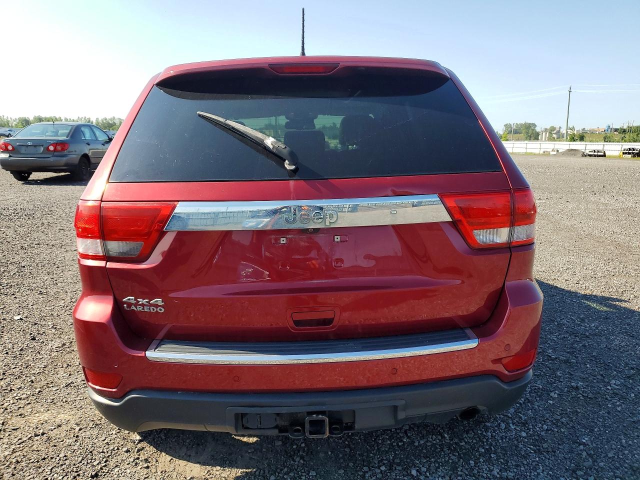 2012 Jeep Grand Cherokee Laredo Red vin: 1C4RJFAG5CC292055