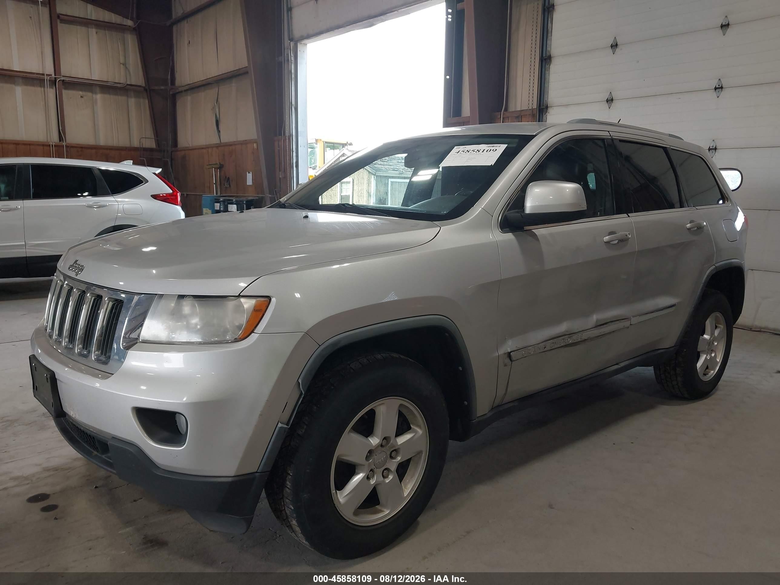 2012 Jeep Grand Cherokee Laredo Silver vin: 1C4RJFAG7CC140522