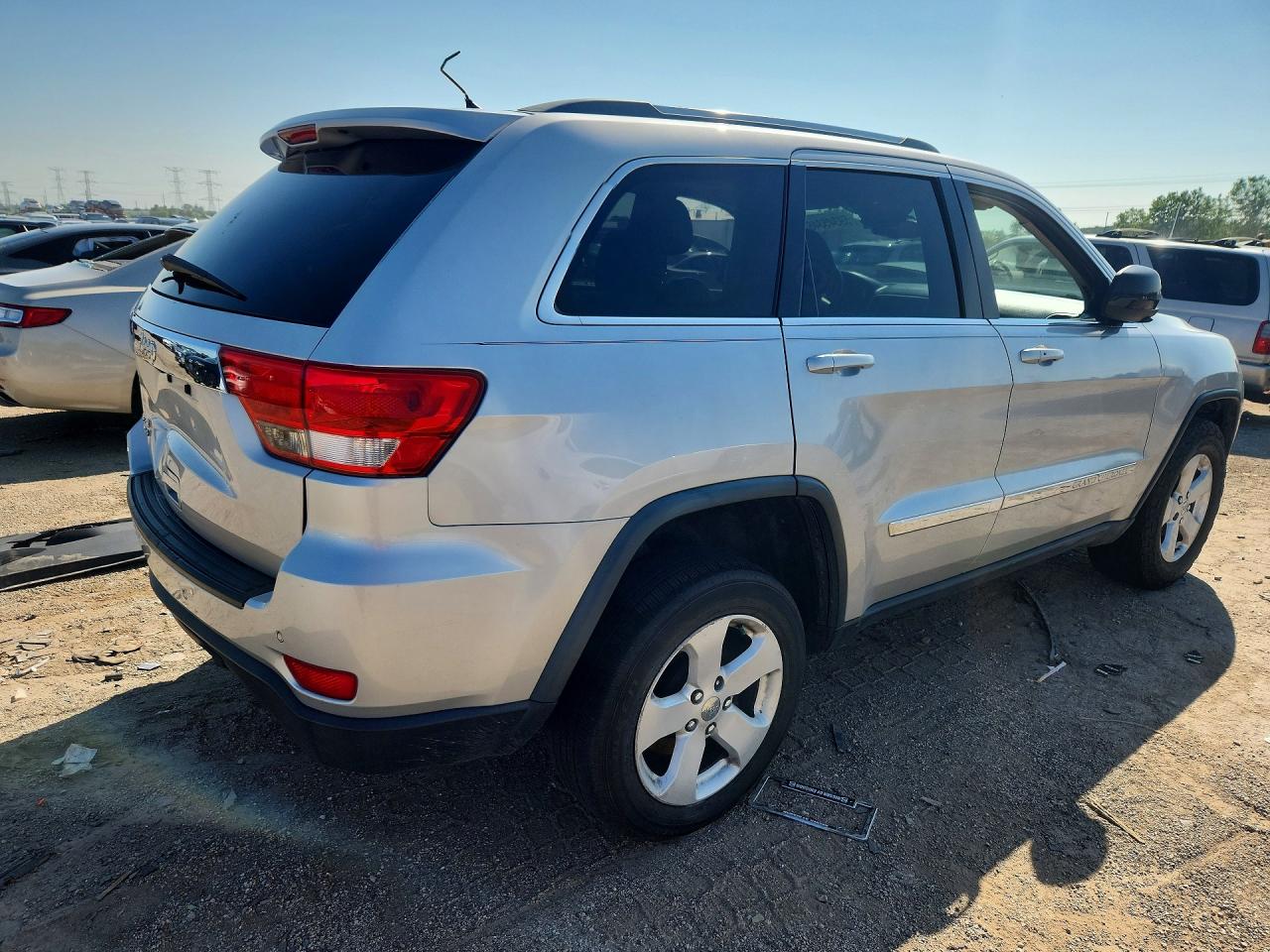 2012 Jeep Grand Cherokee Laredo Silver vin: 1C4RJFAG7CC220418