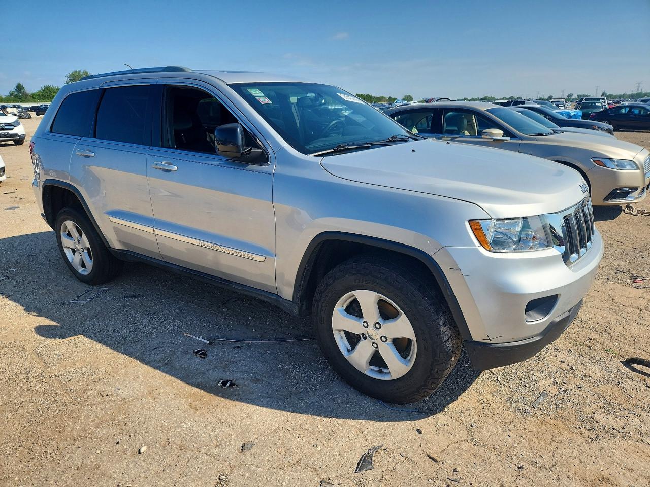 2012 Jeep Grand Cherokee Laredo Silver vin: 1C4RJFAG7CC220418