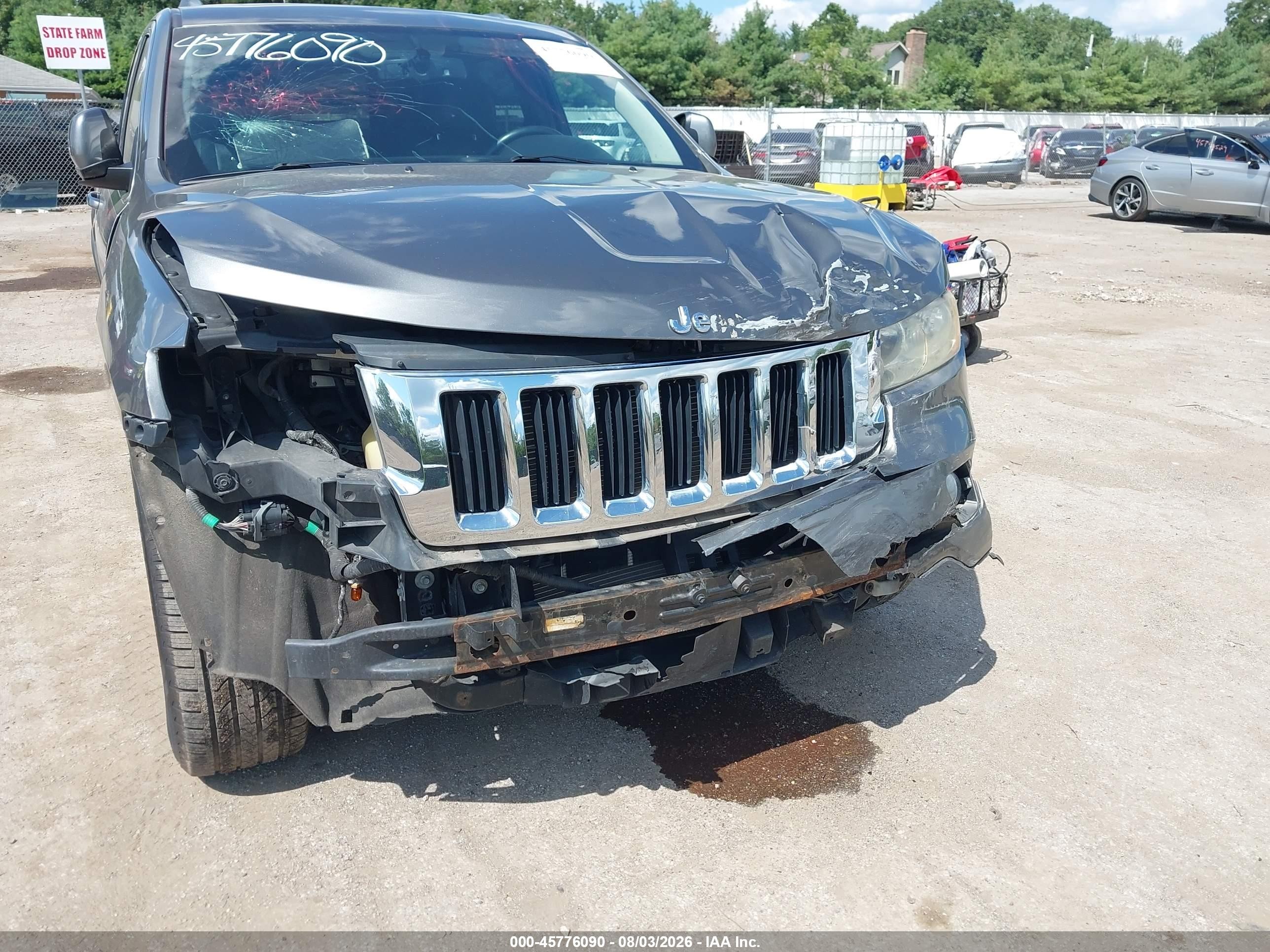 2012 Jeep Grand Cherokee Laredo Серый vin: 1C4RJFAG7CC255444