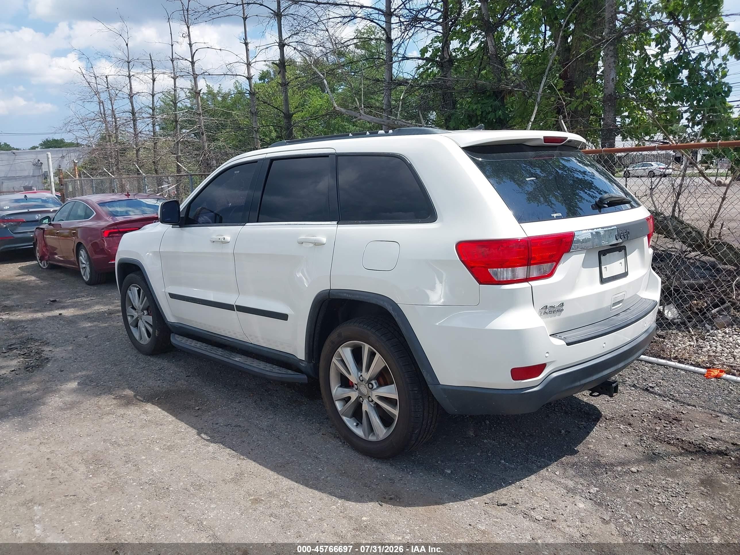 2012 Jeep Grand Cherokee Laredo Белый vin: 1C4RJFAG7CC341319