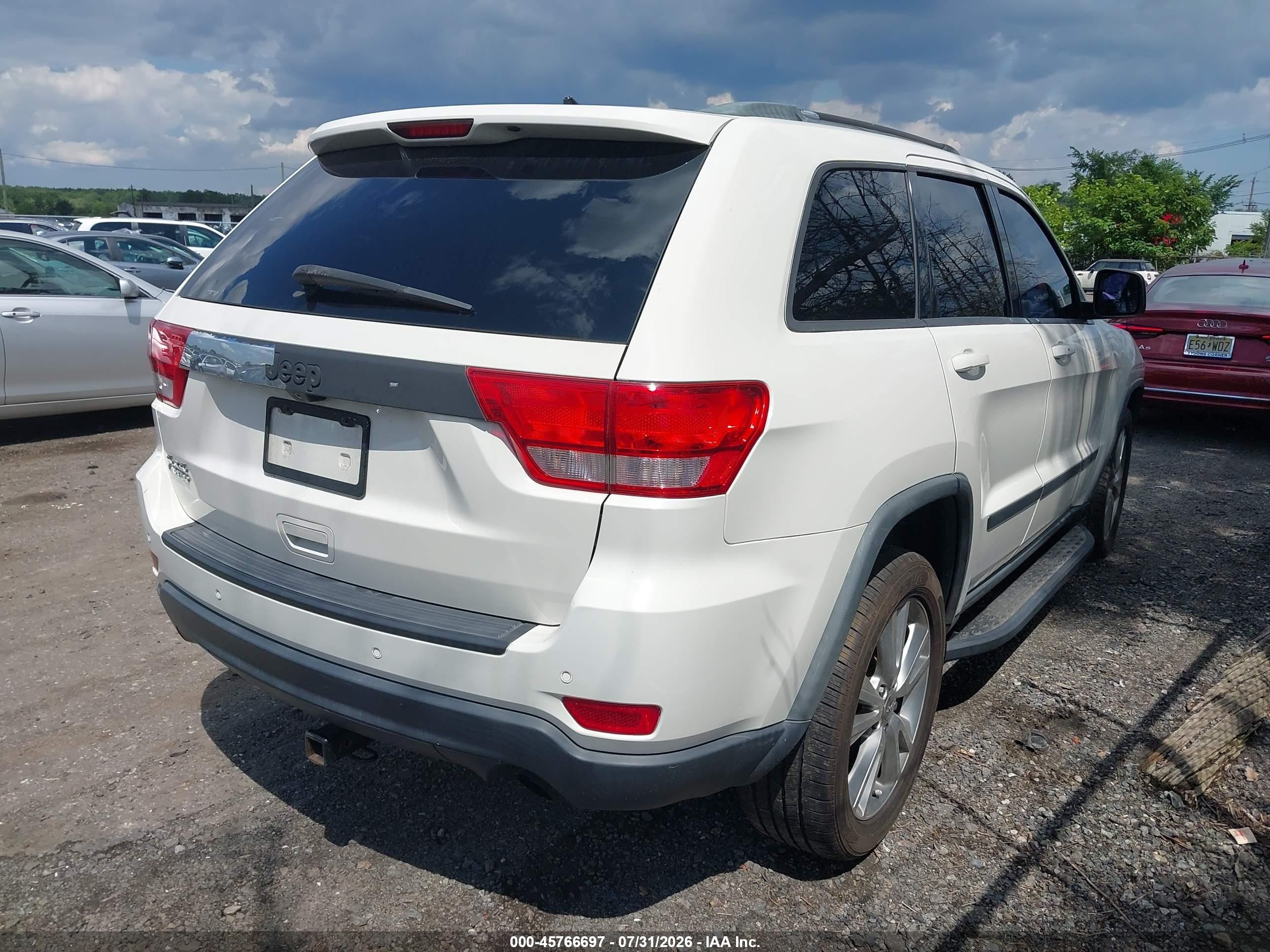2012 Jeep Grand Cherokee Laredo Белый vin: 1C4RJFAG7CC341319