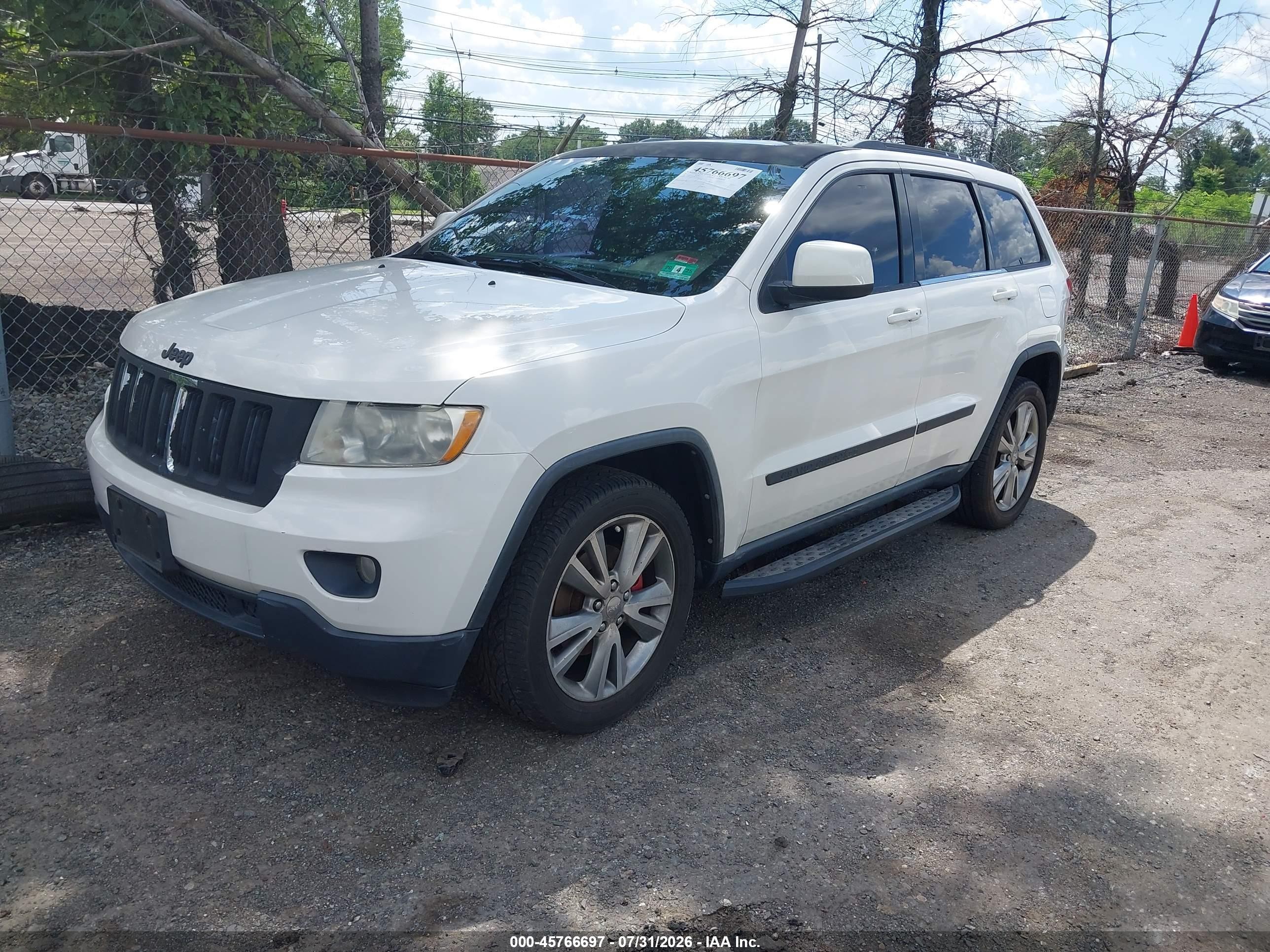 2012 Jeep Grand Cherokee Laredo Белый vin: 1C4RJFAG7CC341319