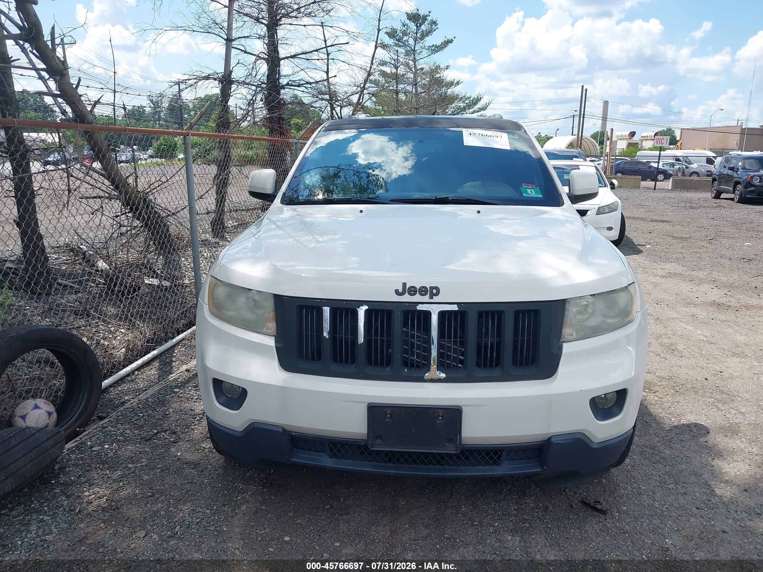 2012 Jeep Grand Cherokee Laredo Белый vin: 1C4RJFAG7CC341319