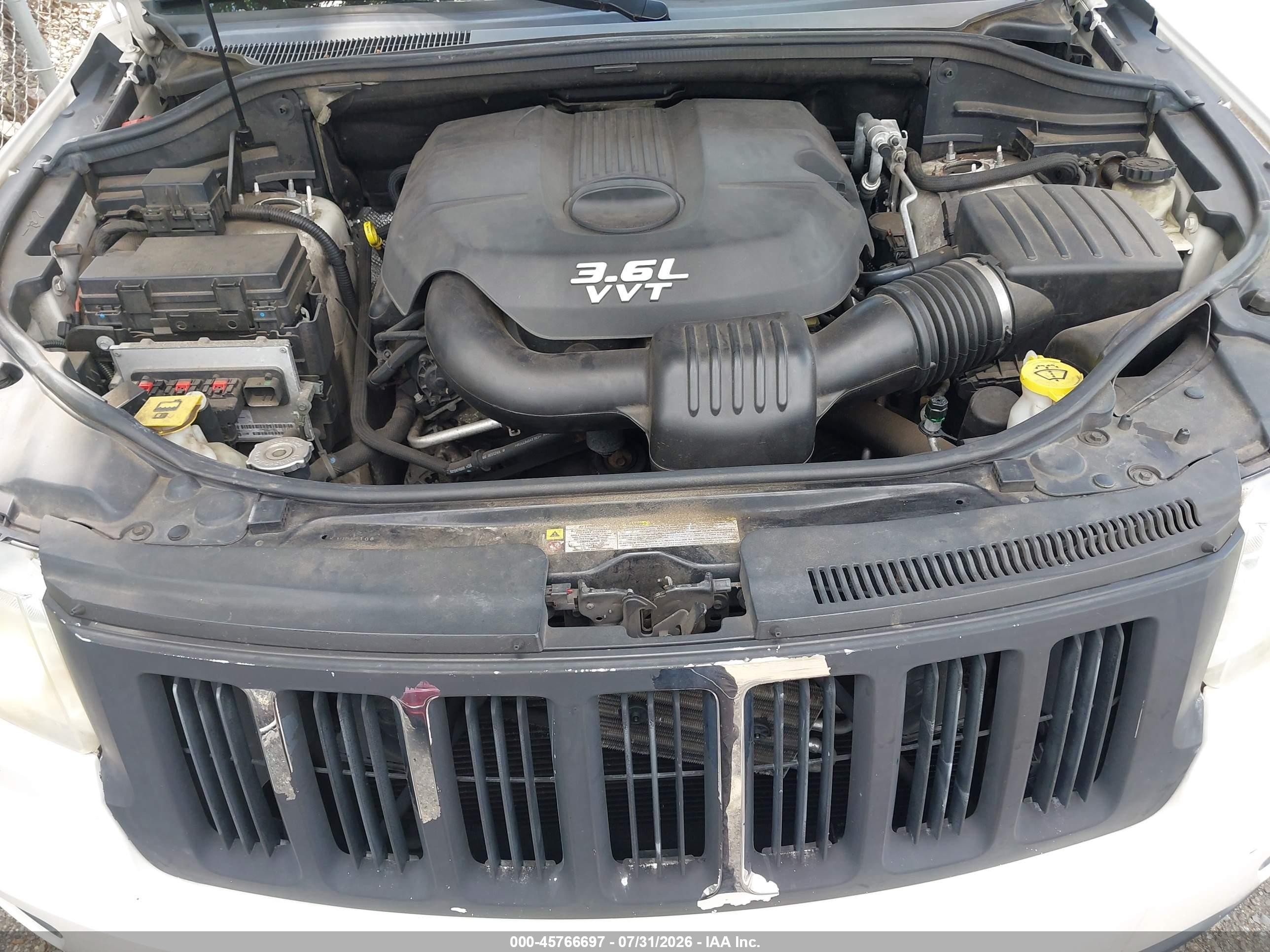 2012 Jeep Grand Cherokee Laredo Белый vin: 1C4RJFAG7CC341319