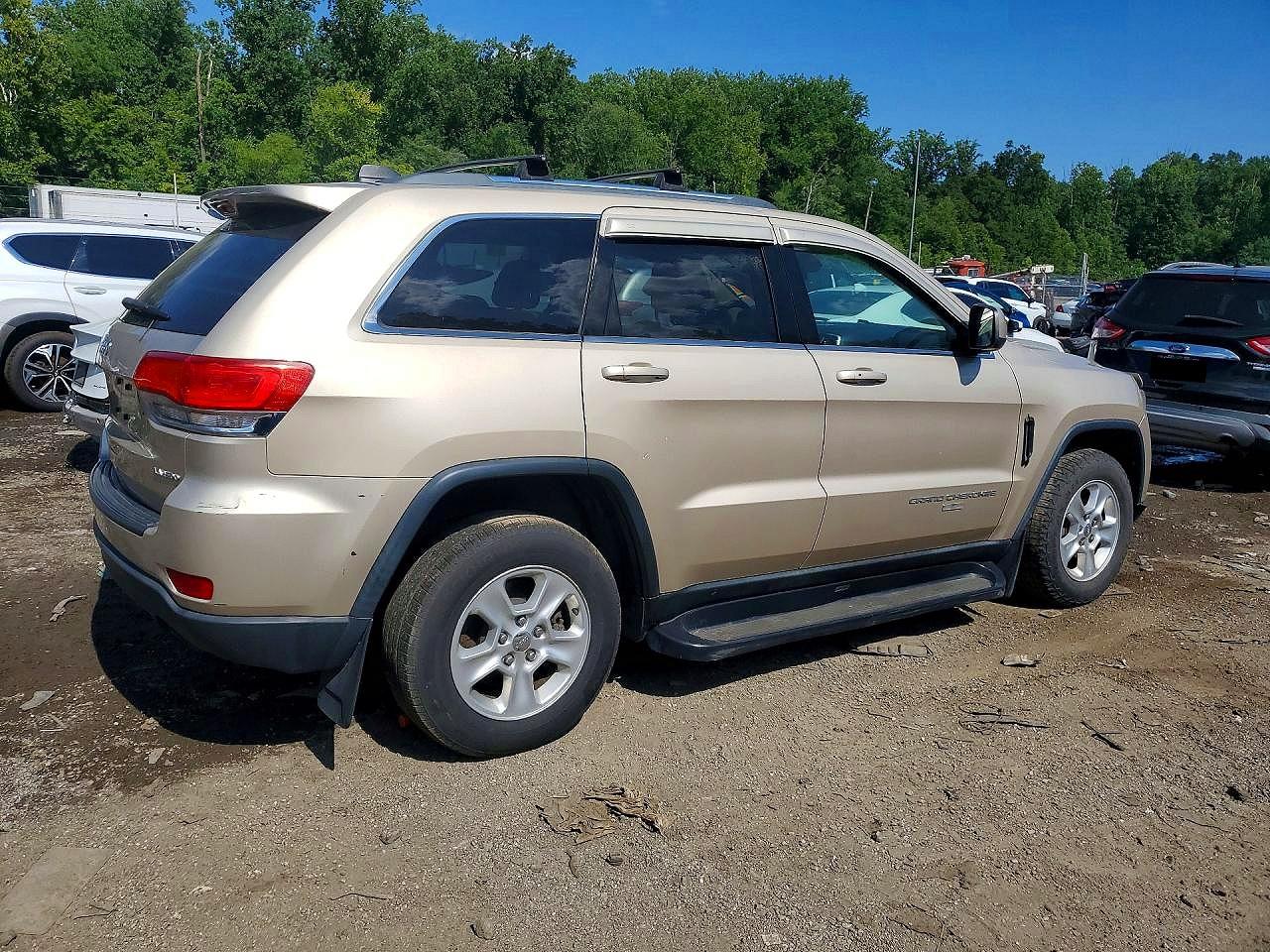 2014 Jeep Grand Cherokee Laredo Gold vin: 1C4RJFAG7EC215089
