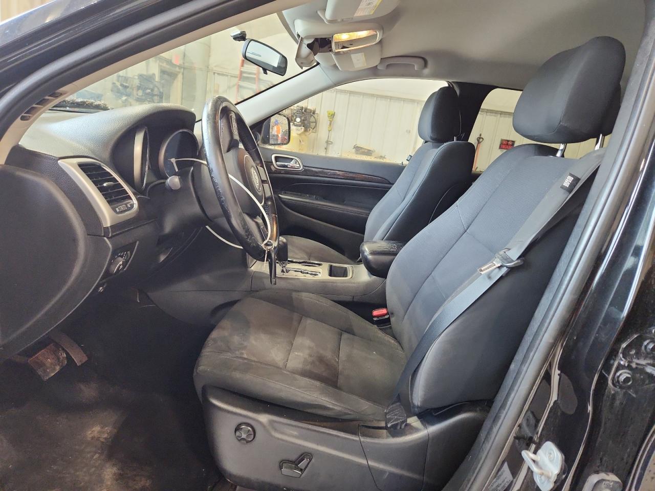 2013 Jeep Grand Cherokee Laredo Black vin: 1C4RJFAG8DC508403 Damage: Left Front Carpet, Worn, Replacement Required