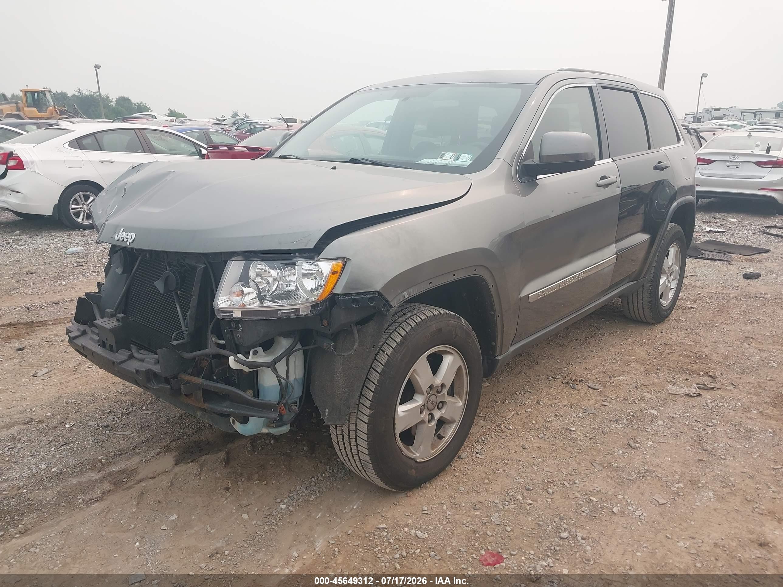 2012 Jeep Grand Cherokee Laredo Серый vin: 1C4RJFAG9CC175711