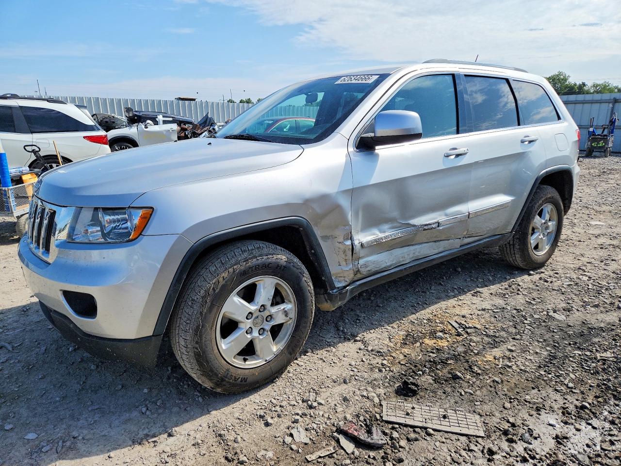 2012 Jeep Grand Cherokee Laredo Серебряный vin: 1C4RJFAG9CC263481