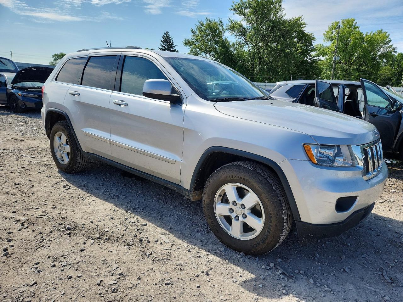 2012 Jeep Grand Cherokee Laredo Серебряный vin: 1C4RJFAG9CC263481