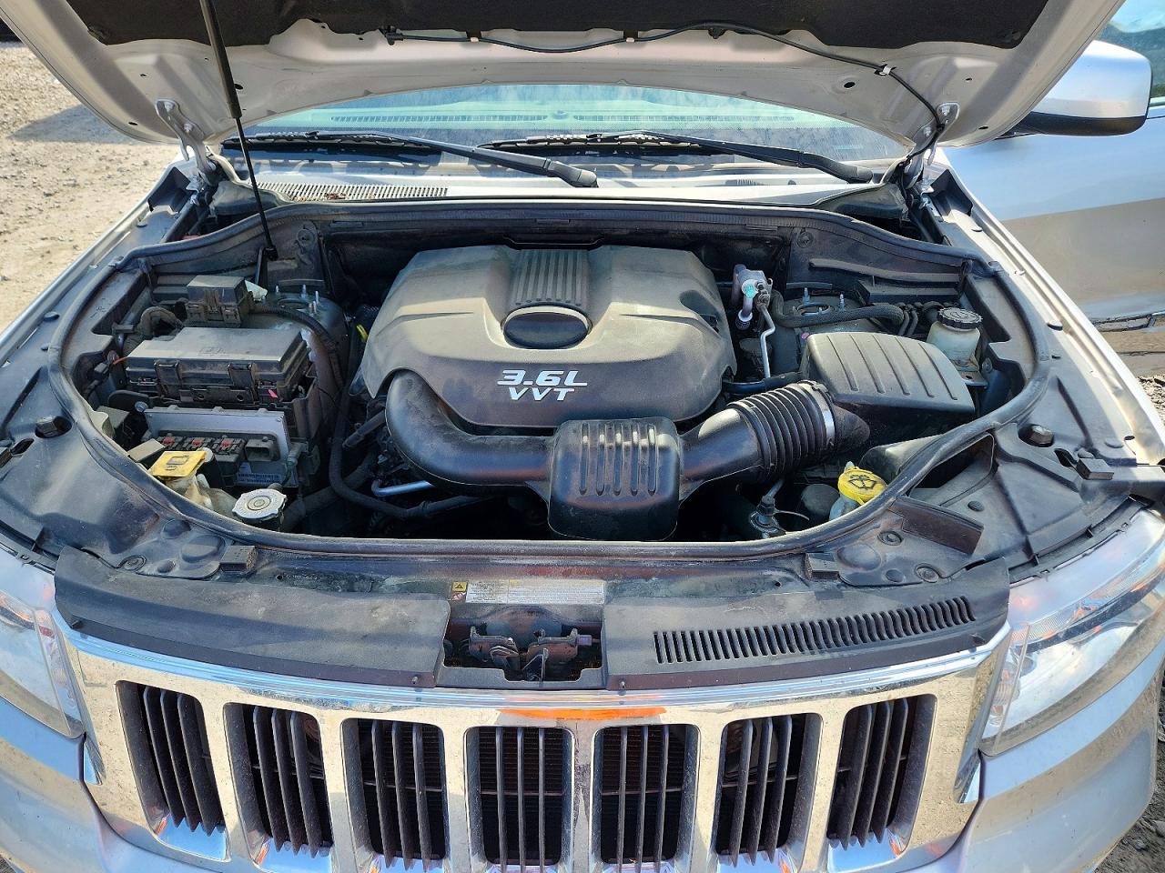 2012 Jeep Grand Cherokee Laredo Серебряный vin: 1C4RJFAG9CC263481