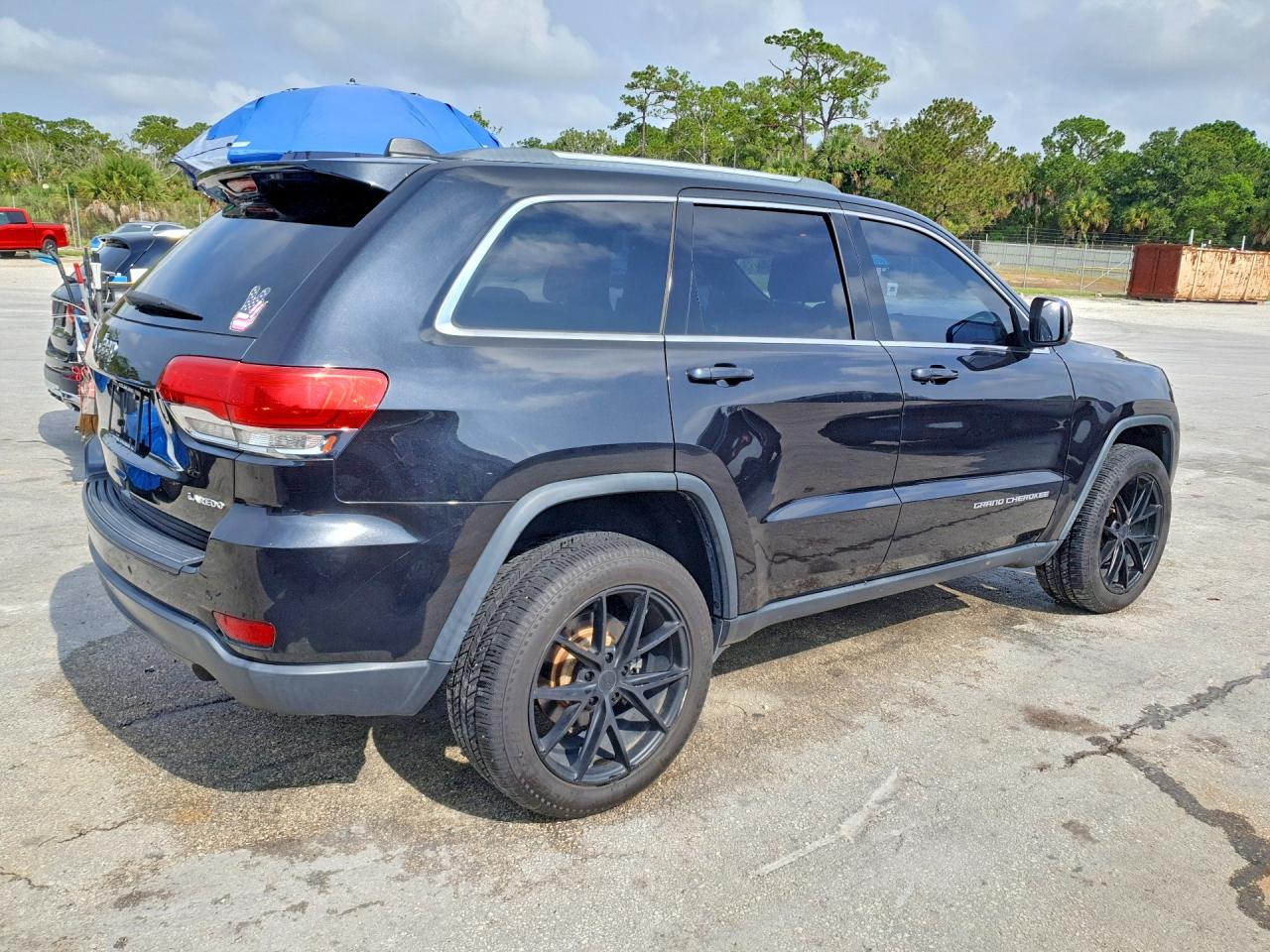2015 Jeep Grand Cherokee Laredo Черный vin: 1C4RJFAG9FC196501
