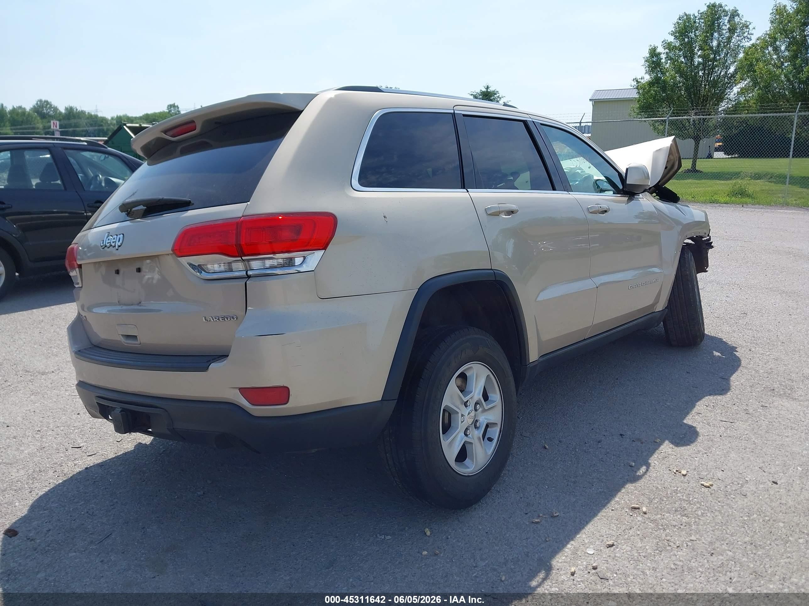 2015 Jeep Grand Cherokee Laredo Tan vin: 1C4RJFAG9FC896051