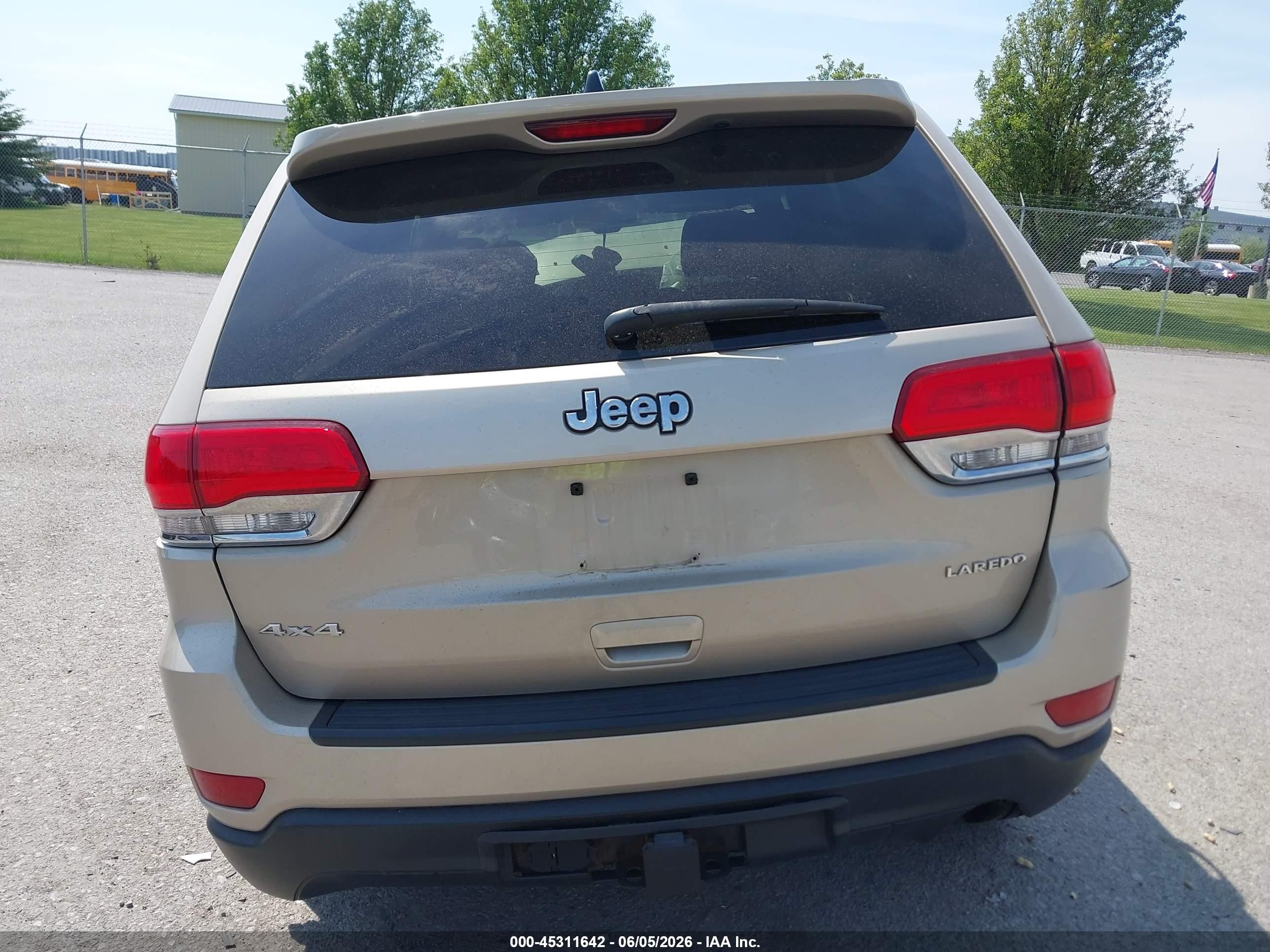 2015 Jeep Grand Cherokee Laredo Tan vin: 1C4RJFAG9FC896051