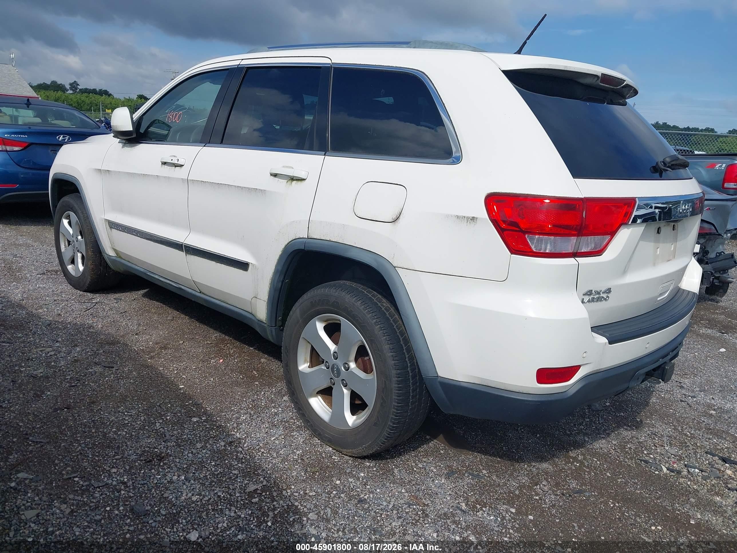 2012 Jeep Grand Cherokee Laredo Белый vin: 1C4RJFAGXCC132737