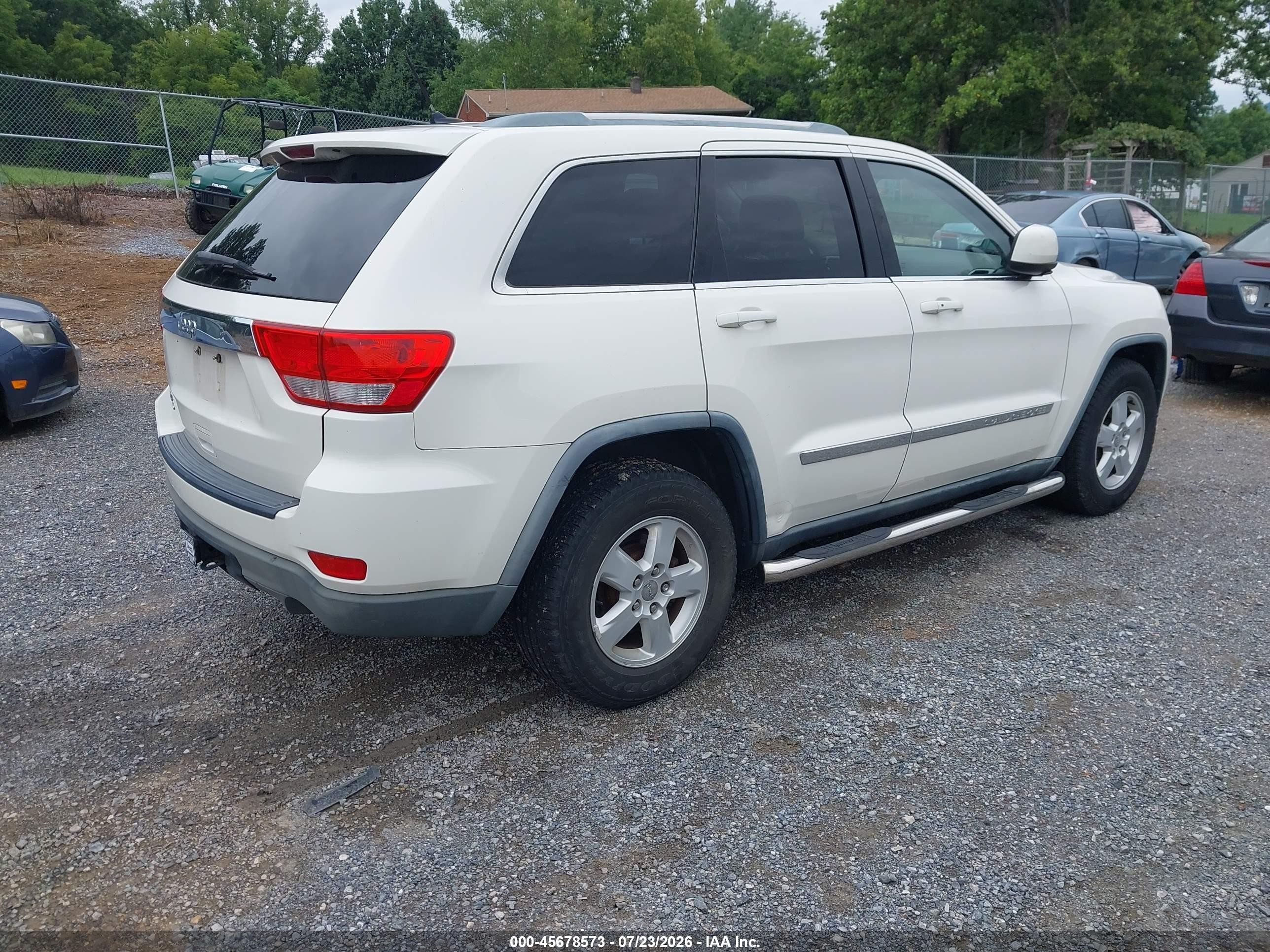 2012 Jeep Grand Cherokee Laredo Белый vin: 1C4RJFAGXCC155743
