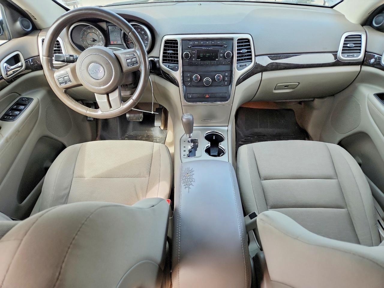 2012 Jeep Grand Cherokee Tan vin: 1C4RJFAGXCC250609