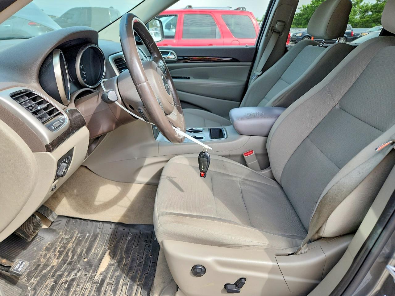 2012 Jeep Grand Cherokee Tan vin: 1C4RJFAGXCC250609