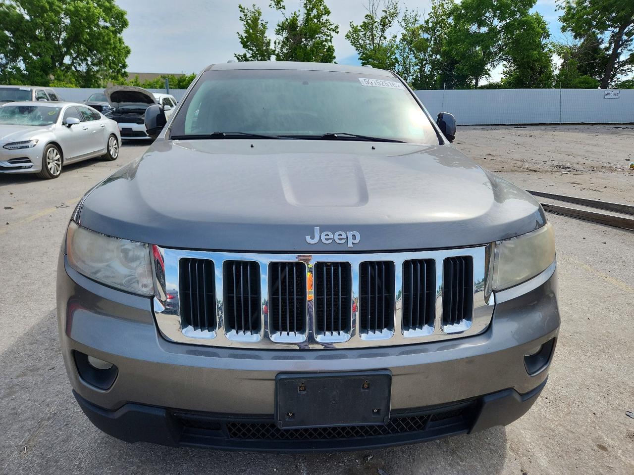 2012 Jeep Grand Cherokee Tan vin: 1C4RJFAGXCC250609