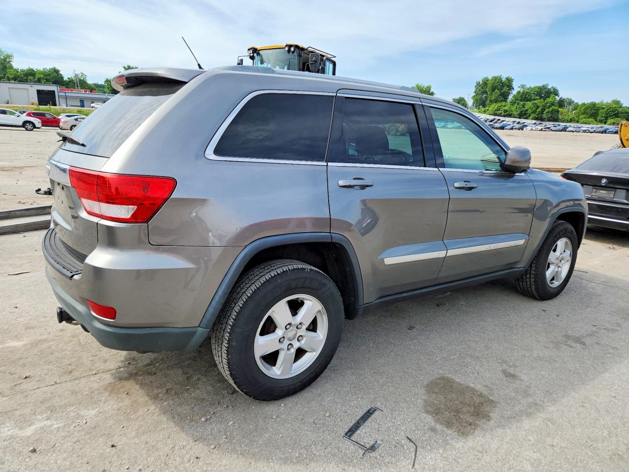 2012 Jeep Grand Cherokee Tan vin: 1C4RJFAGXCC250609