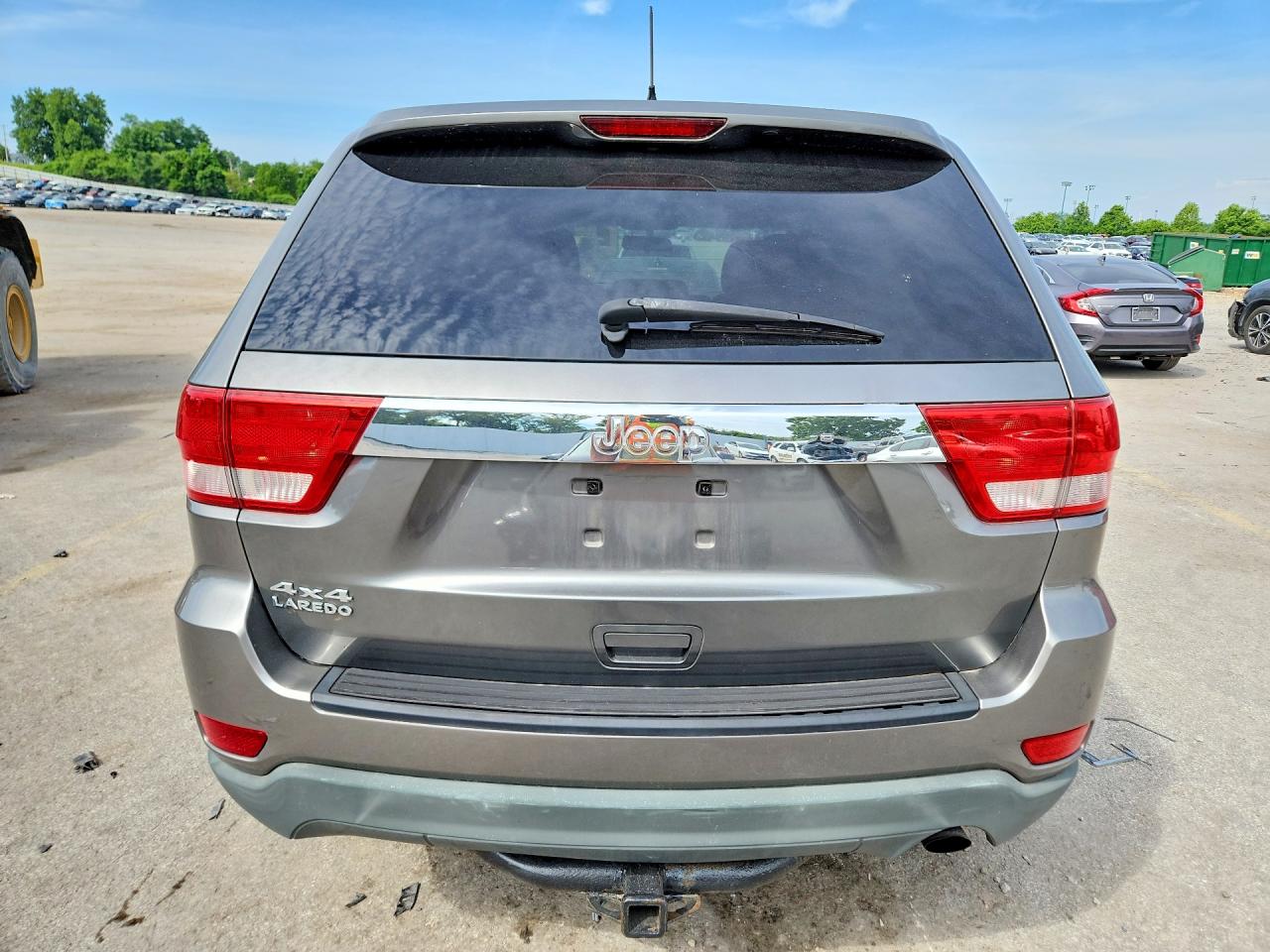 2012 Jeep Grand Cherokee Tan vin: 1C4RJFAGXCC250609