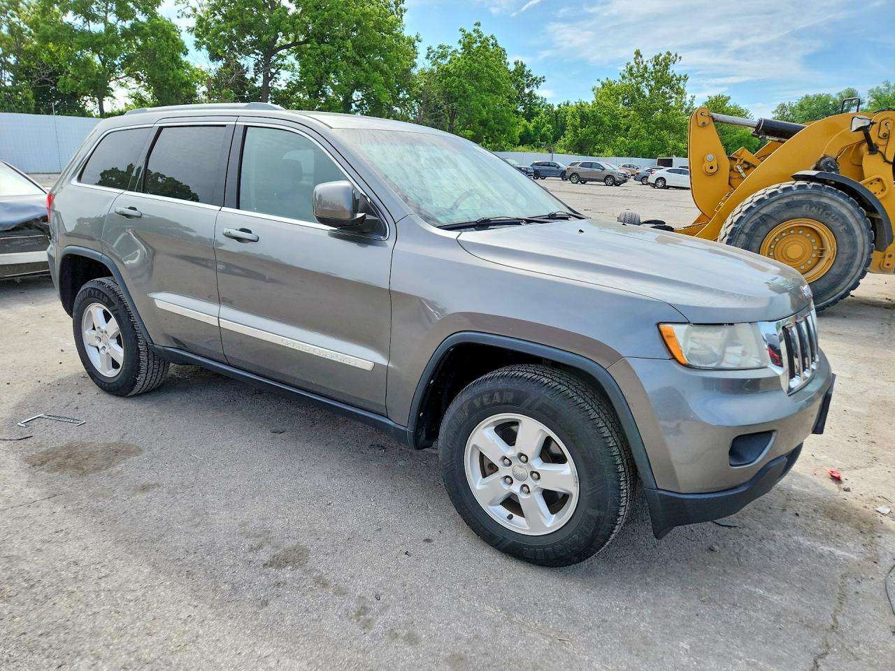 2012 Jeep Grand Cherokee Tan vin: 1C4RJFAGXCC250609
