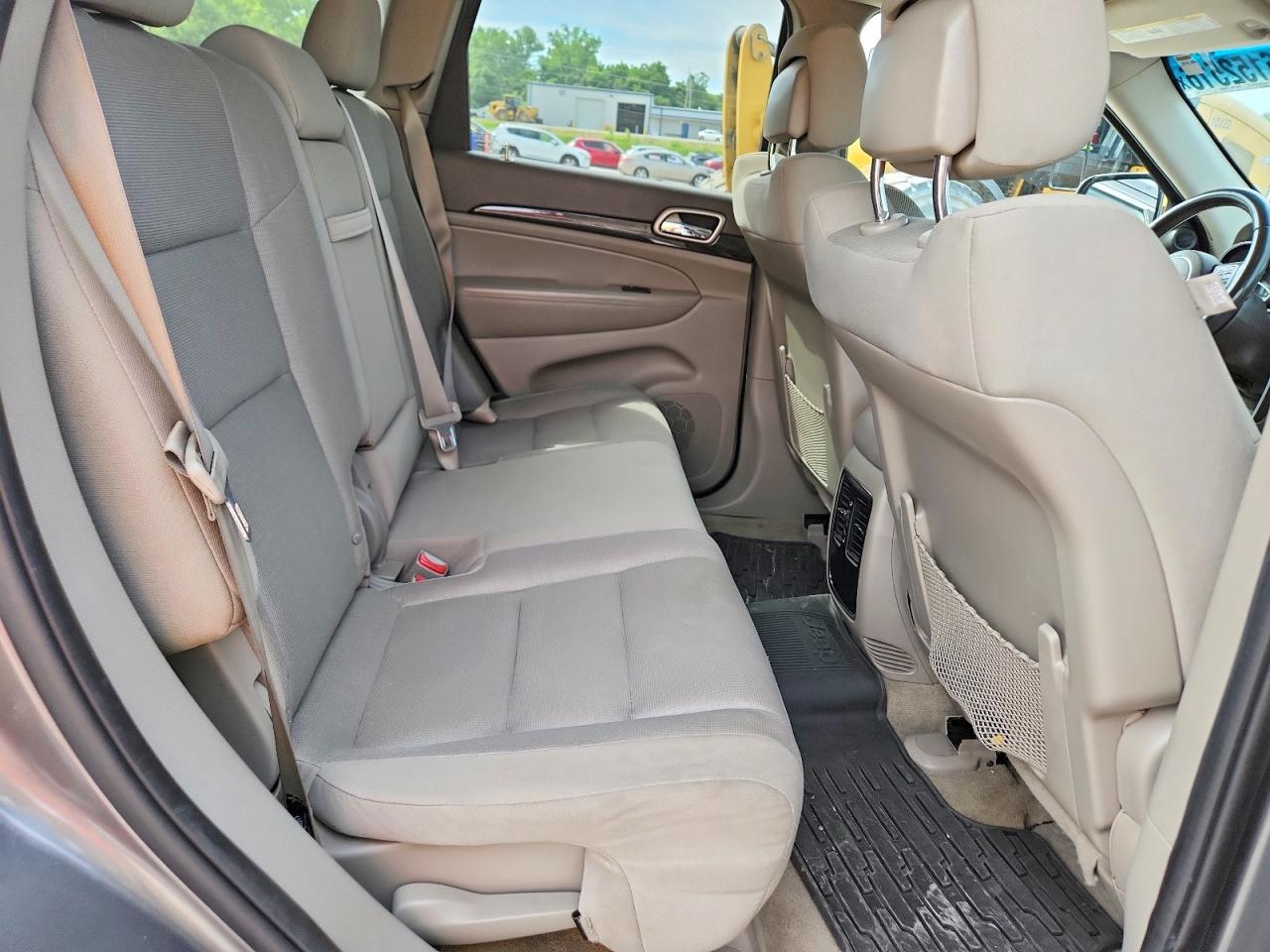 2012 Jeep Grand Cherokee Tan vin: 1C4RJFAGXCC250609