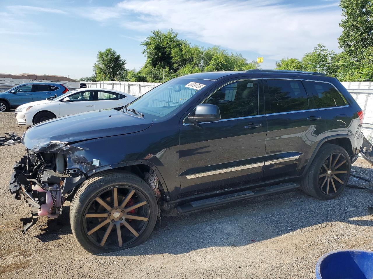2012 Jeep Grand Cherokee Laredo Черный vin: 1C4RJFAGXCC278944