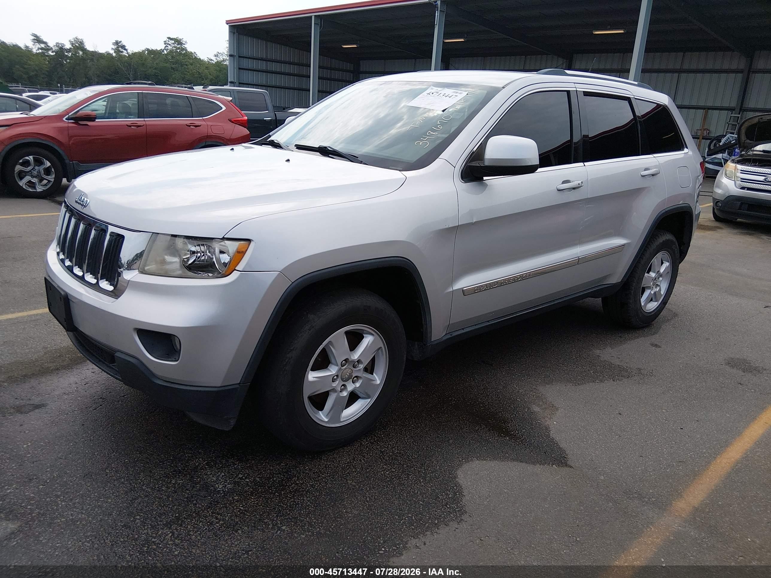 2012 Jeep Grand Cherokee Laredo Серебряный vin: 1C4RJFAGXCC348670