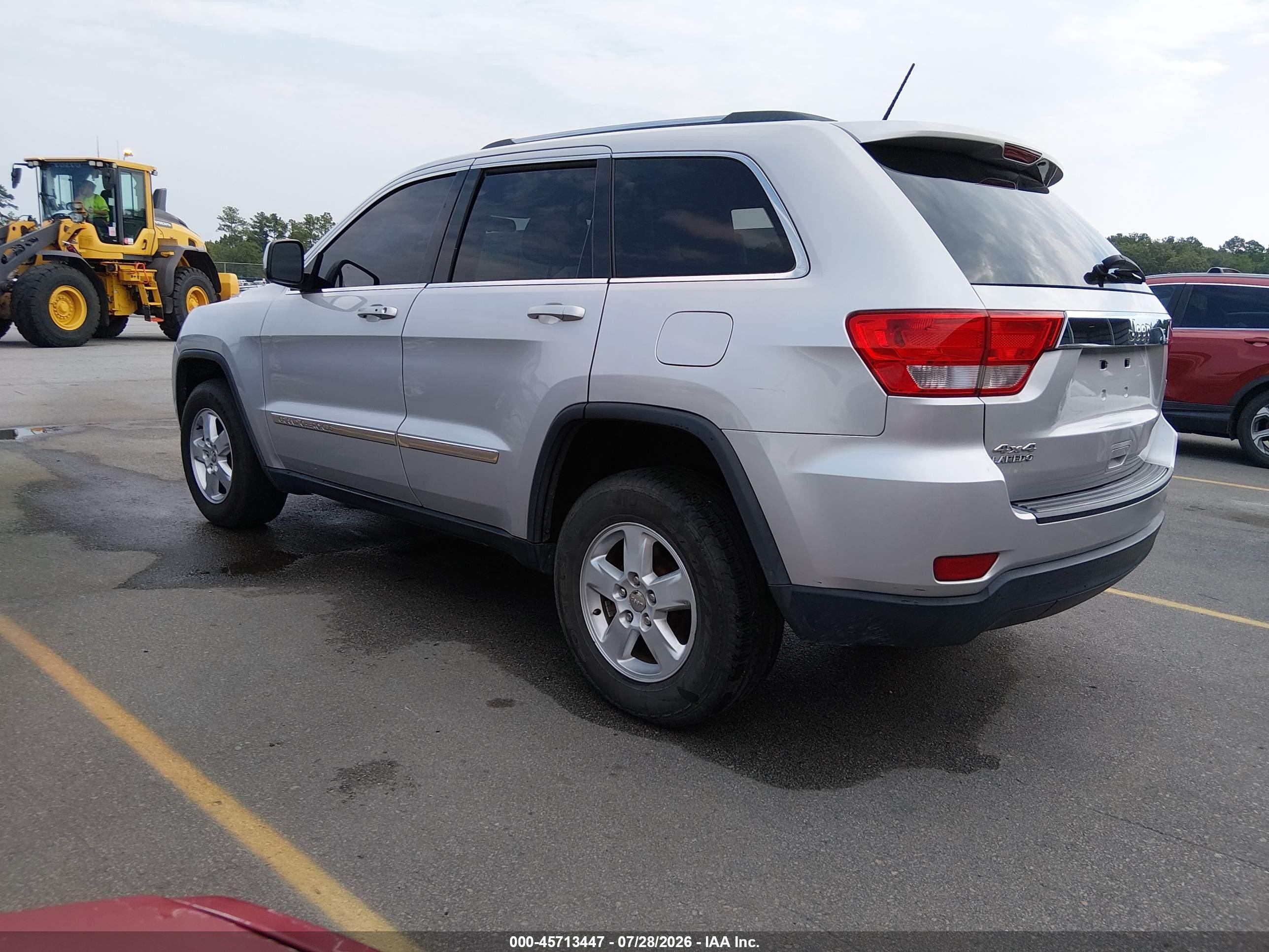 2012 Jeep Grand Cherokee Laredo Серебряный vin: 1C4RJFAGXCC348670