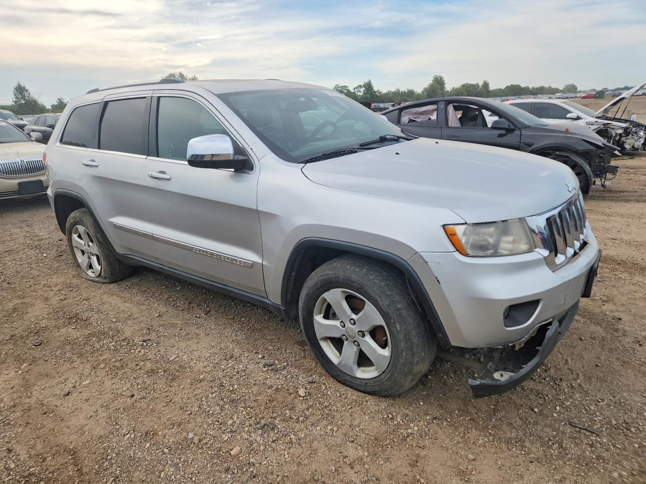 2013 Jeep Grand Cherokee Laredo Серебряный vin: 1C4RJFAGXDC609880