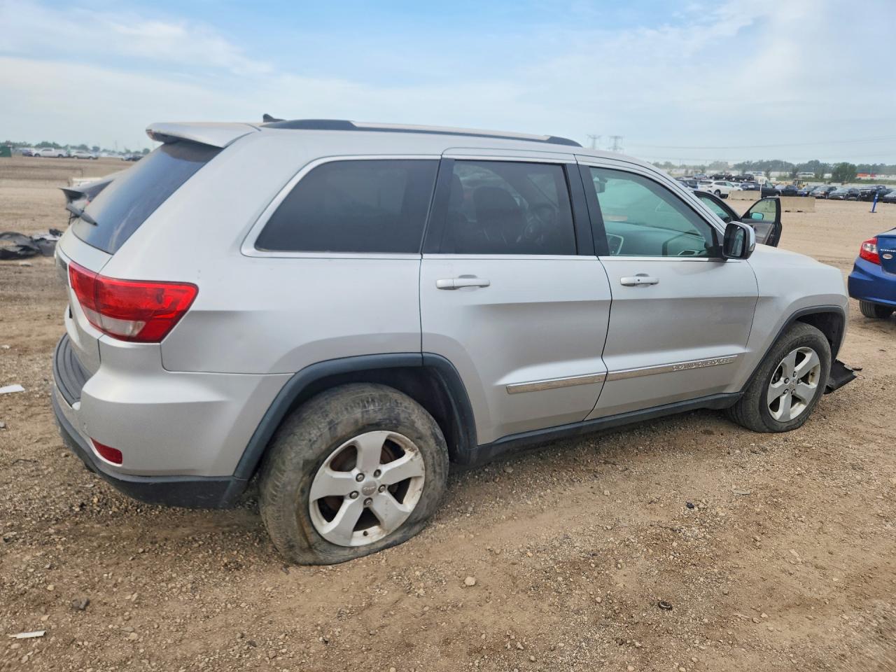 2013 Jeep Grand Cherokee Laredo Серебряный vin: 1C4RJFAGXDC609880