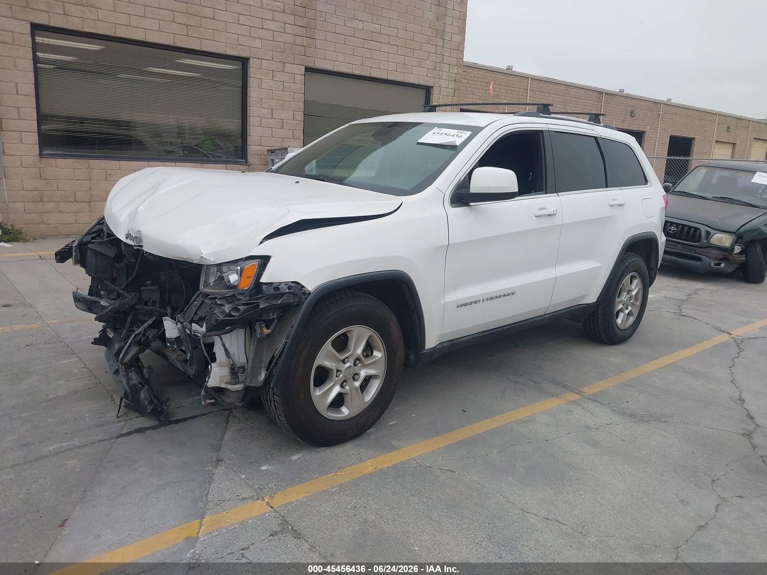 2014 Jeep Grand Cherokee Laredo Белый vin: 1C4RJFAGXEC232856