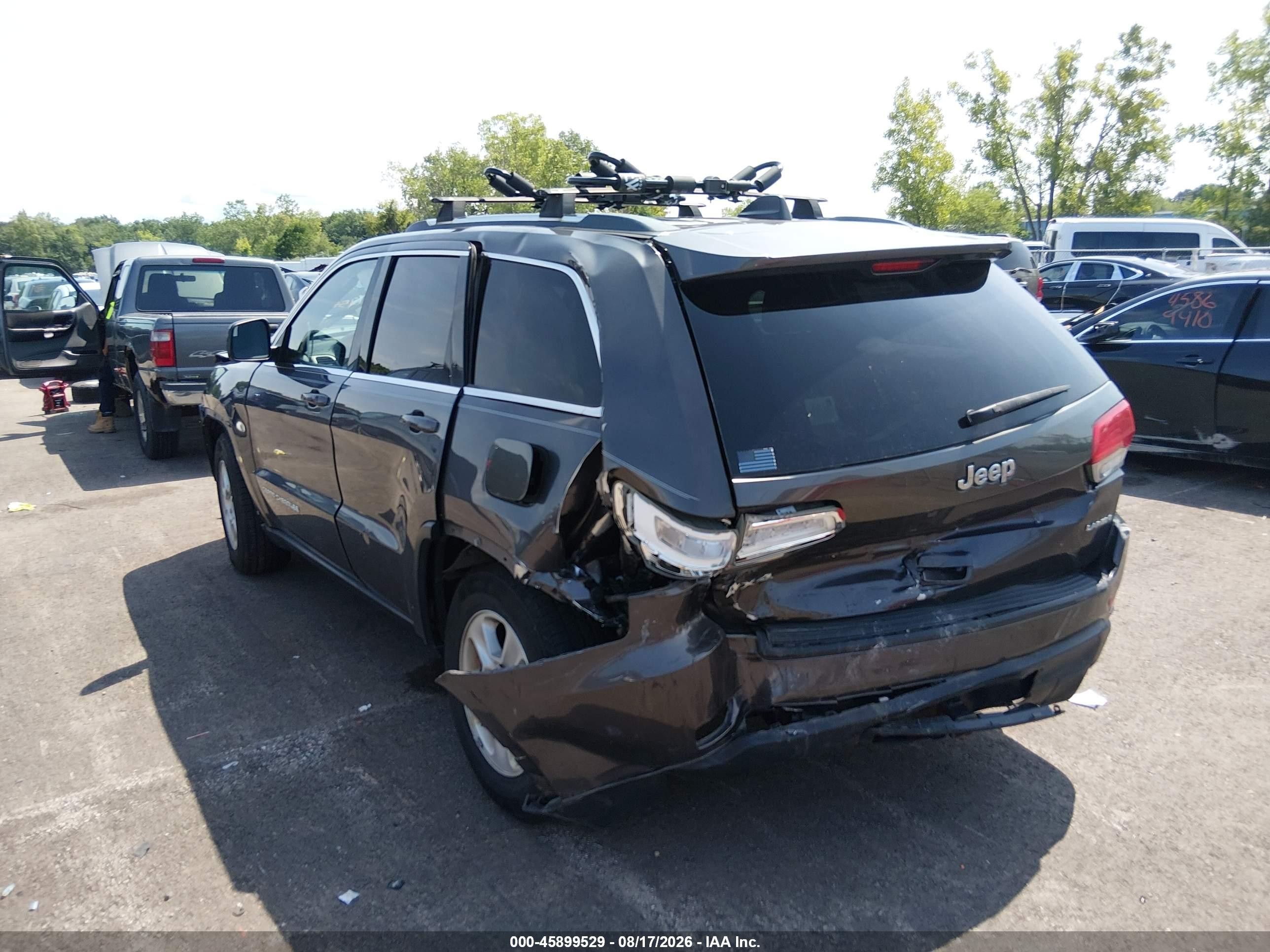 2015 Jeep Grand Cherokee Laredo Серый vin: 1C4RJFAGXFC173535