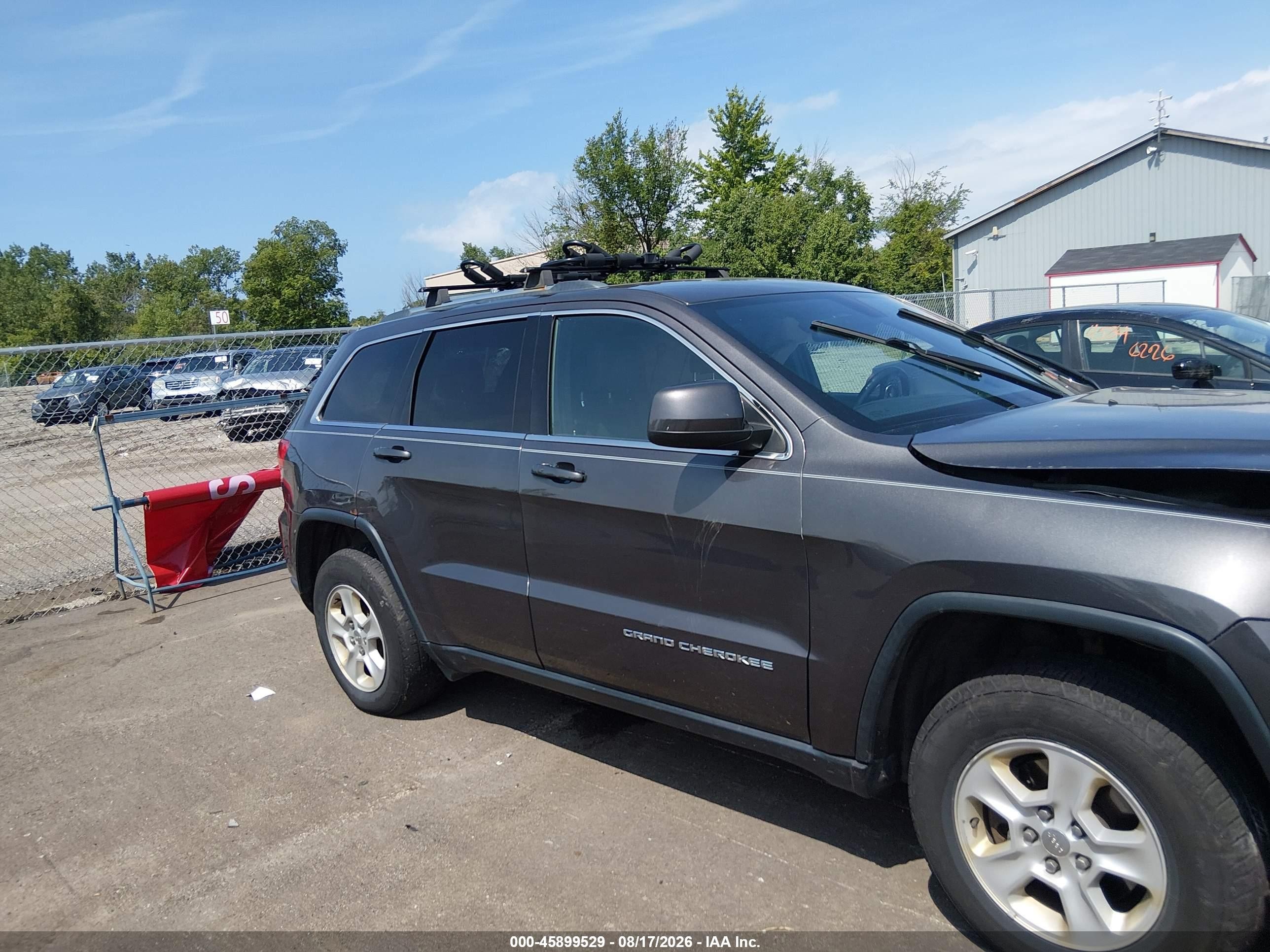 2015 Jeep Grand Cherokee Laredo Серый vin: 1C4RJFAGXFC173535