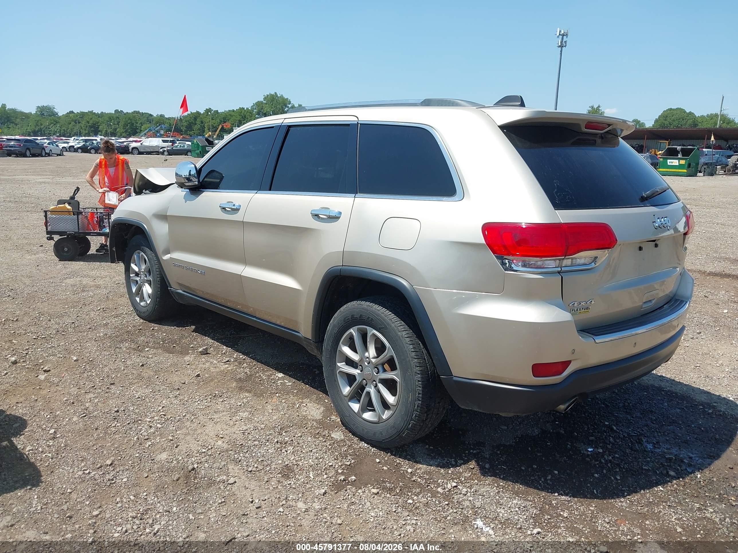 2014 Jeep Grand Cherokee Limited Золотой vin: 1C4RJFBG1EC152926