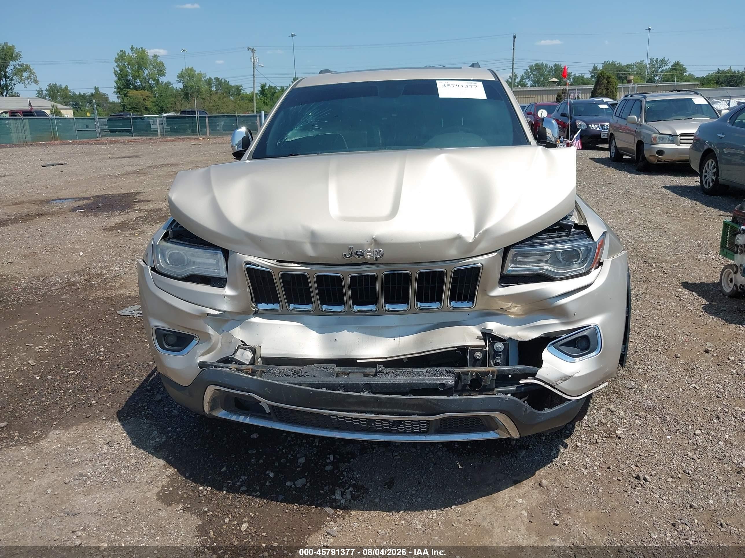 2014 Jeep Grand Cherokee Limited Золотой vin: 1C4RJFBG1EC152926