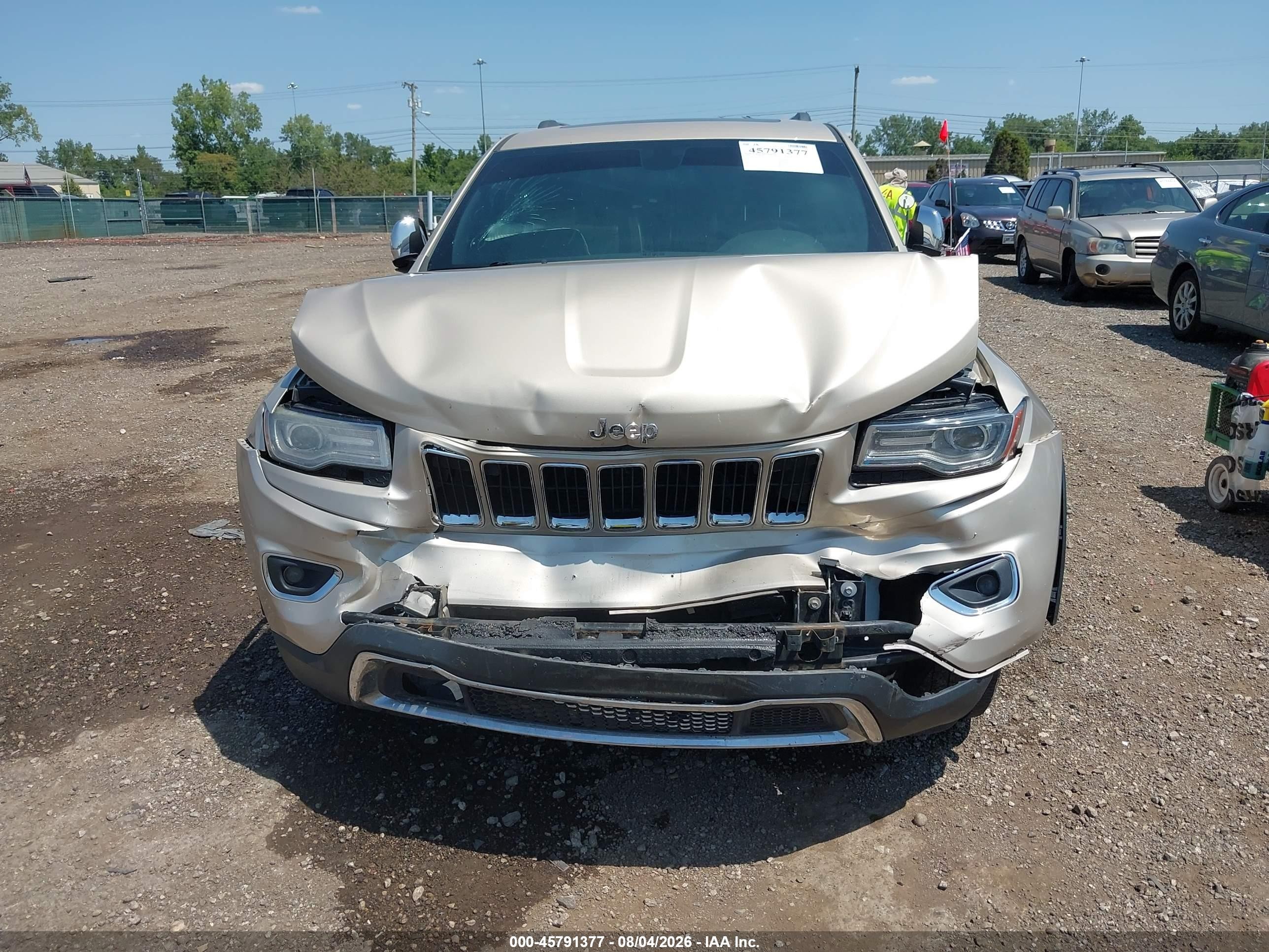 2014 Jeep Grand Cherokee Limited Золотой vin: 1C4RJFBG1EC152926
