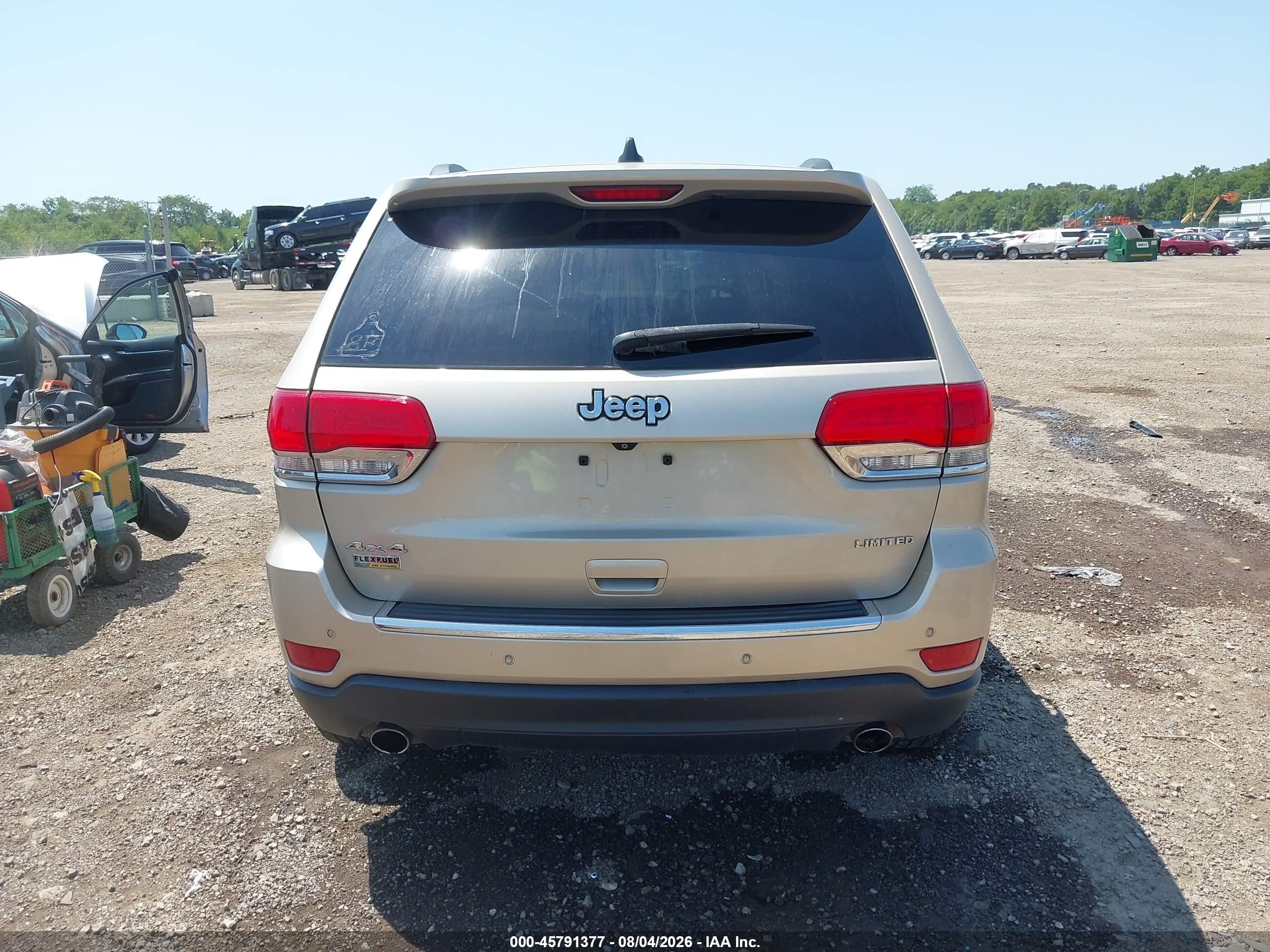2014 Jeep Grand Cherokee Limited Золотой vin: 1C4RJFBG1EC152926