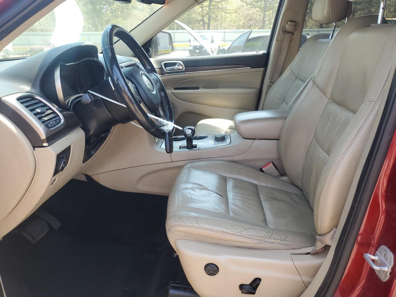 2014 Jeep Grand Cherokee Limited Maroon vin: 1C4RJFBG2EC269172 Damage: Left Front Seat Cushion, Torn, 7 To 8 Inches