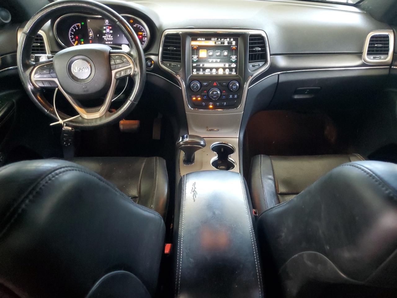 2014 Jeep Grand Cherokee Limited Black vin: 1C4RJFBG4EC215579 Damage: Console Cover, Torn, 2 To 3 Inches