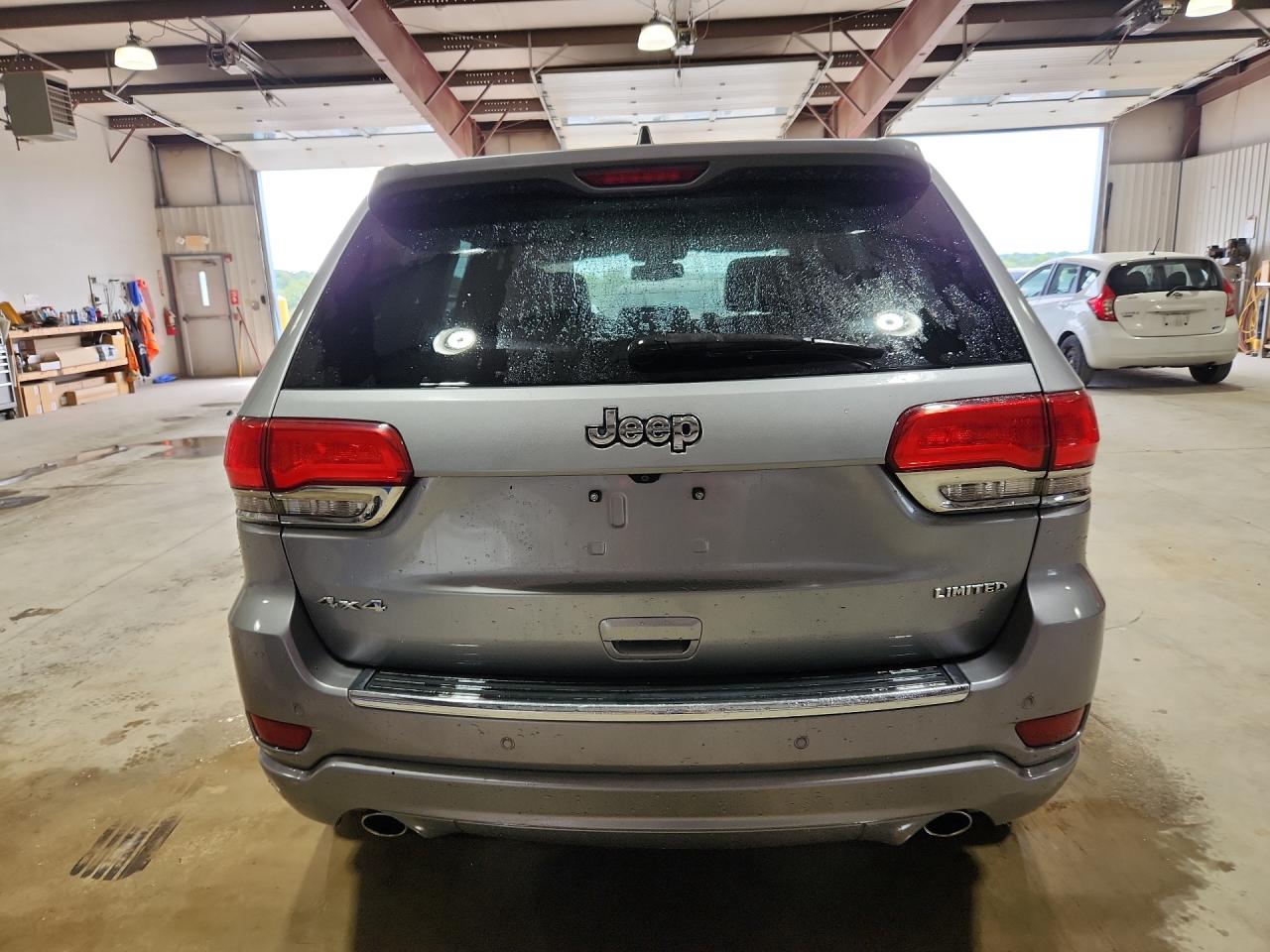 2014 Jeep Grand Cherokee Limited Gray vin: 1C4RJFBG9EC375683 Damage: Rear Bumper, Heavy Scratch, > 12 Inches